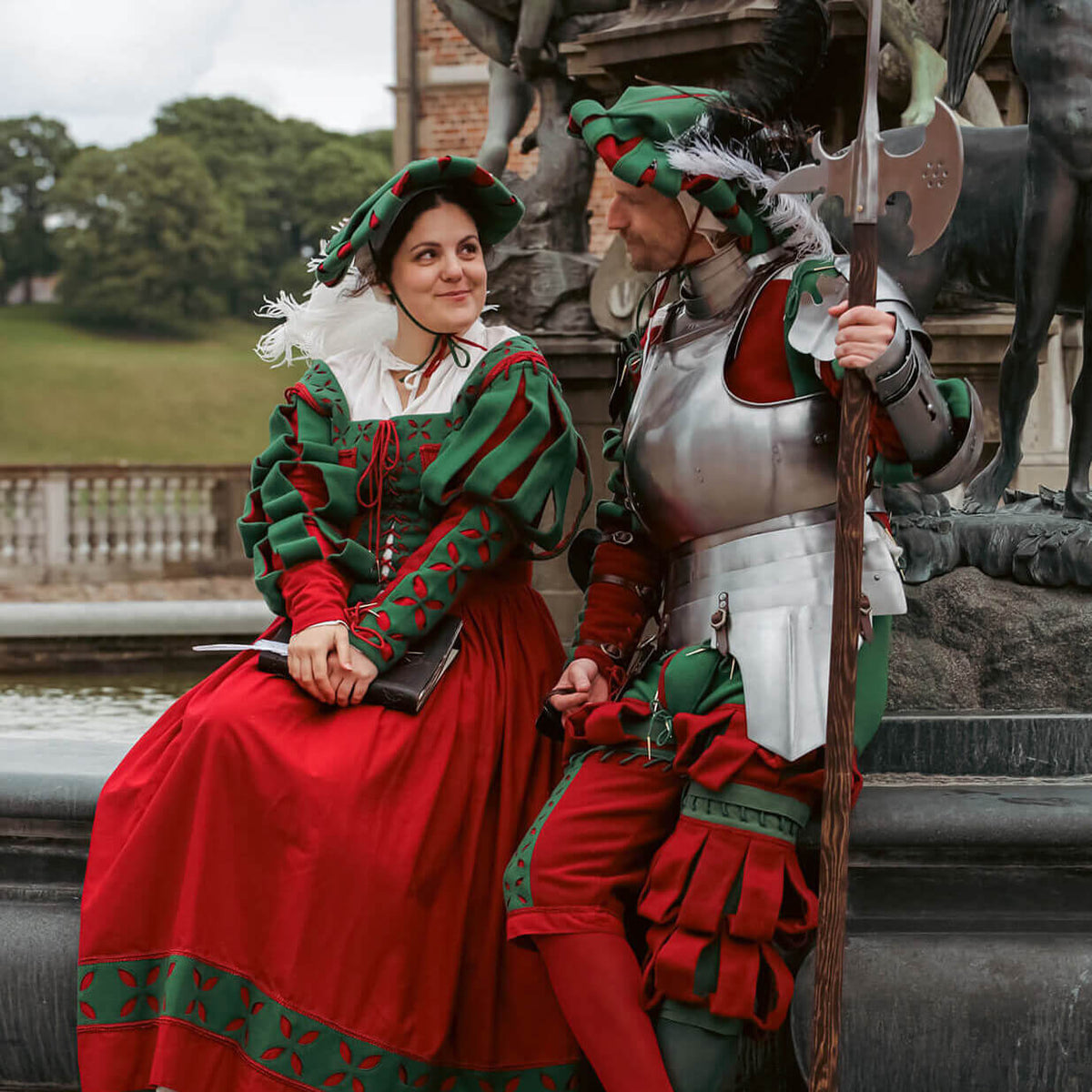 Renaissance Clothing - Yoremade models wearing traditional Renaissance attire with vibrant colors and historic details.