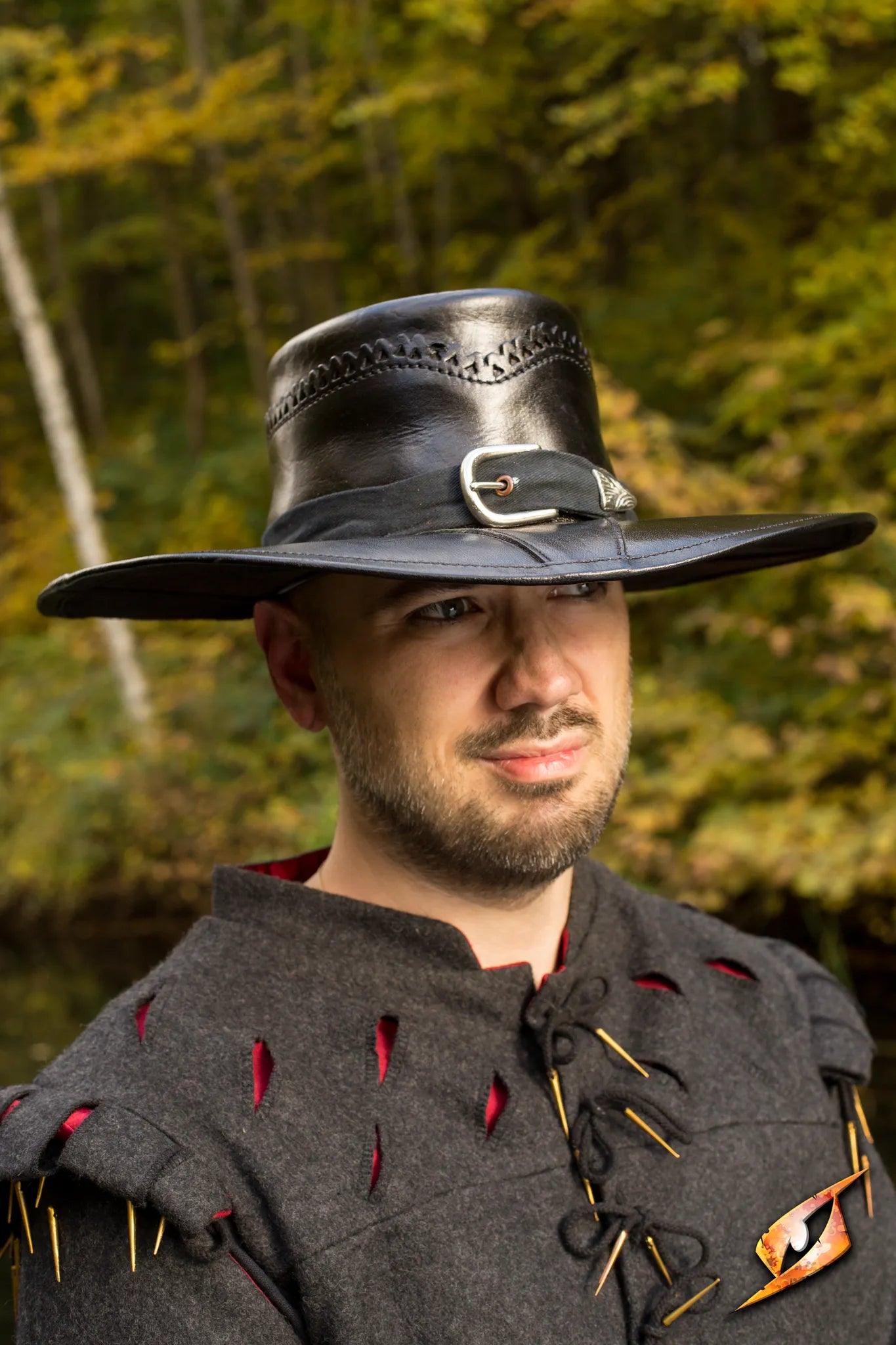 Man wearing an Epic Black Witch Hunter Hat from Epic Armoury, showcasing gothic style with a leather pentagram.