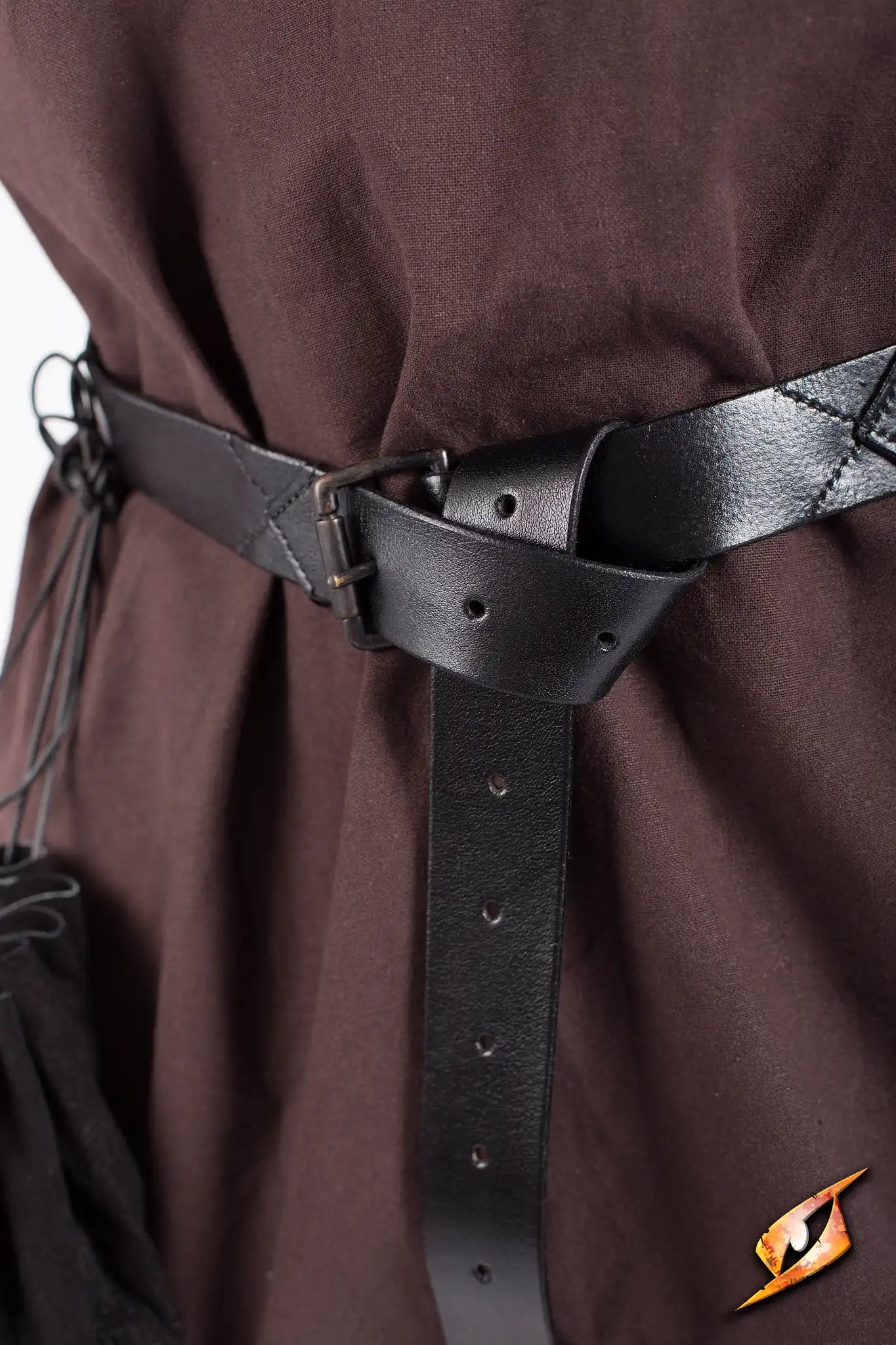 Close-up of X-Belt featuring black leather design and adjustable buckle.