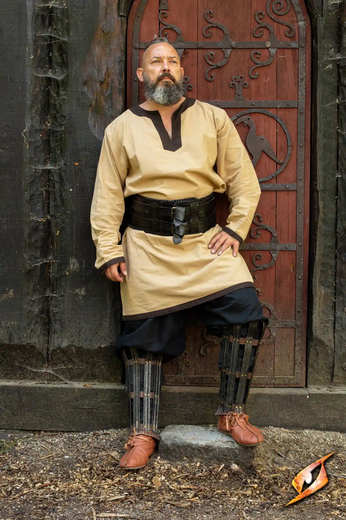 A warrior dressed in traditional attire, showcasing a sturdy Barbarian Belt for carrying gear.