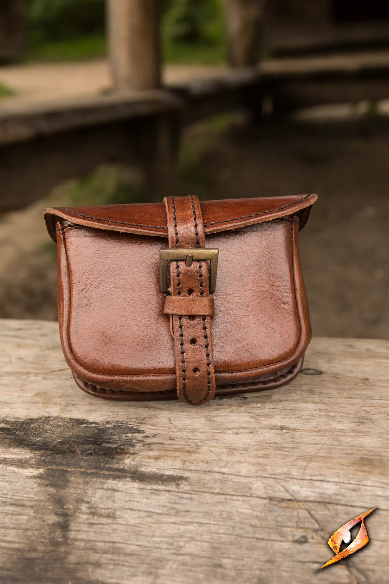Warrior Bag - Small in ox brown leather with brass buckle, perfect for securely carrying items during combat.