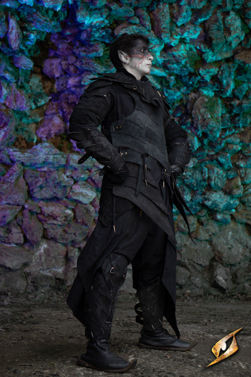 Shadow Armour Set - Suede worn by a model against a textured background in an enchanted forest setting.