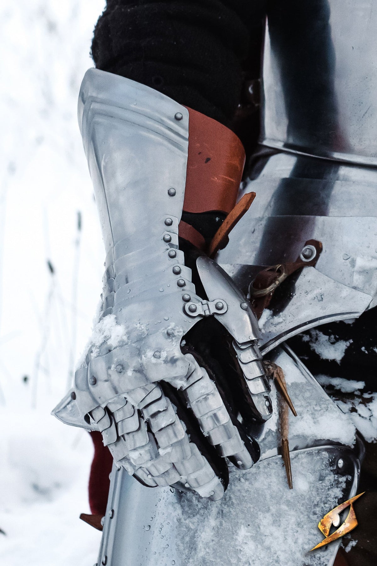 Gauntlets: early renaissance articulated steel gloves providing protection and maneuverability in combat.