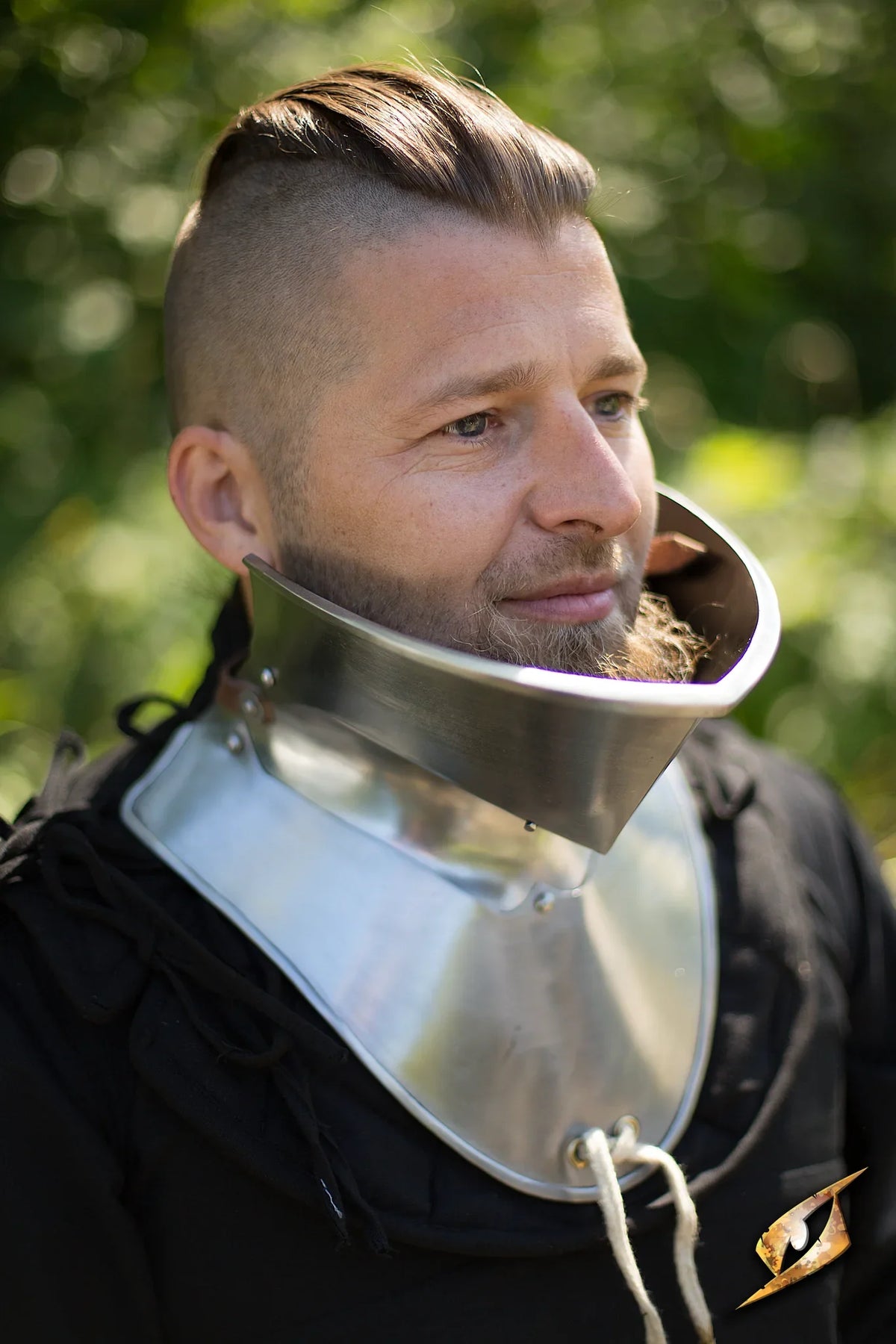 Bevor handmade armor displayed on a model, designed for maximum face and neck protection in medieval style.
