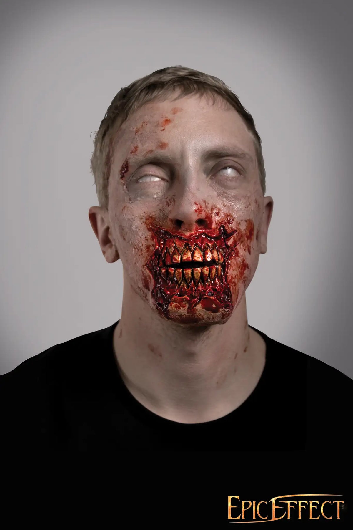Zombie Teeth Exposed: gruesome character with bloody, zombie-like features and exposed teeth.