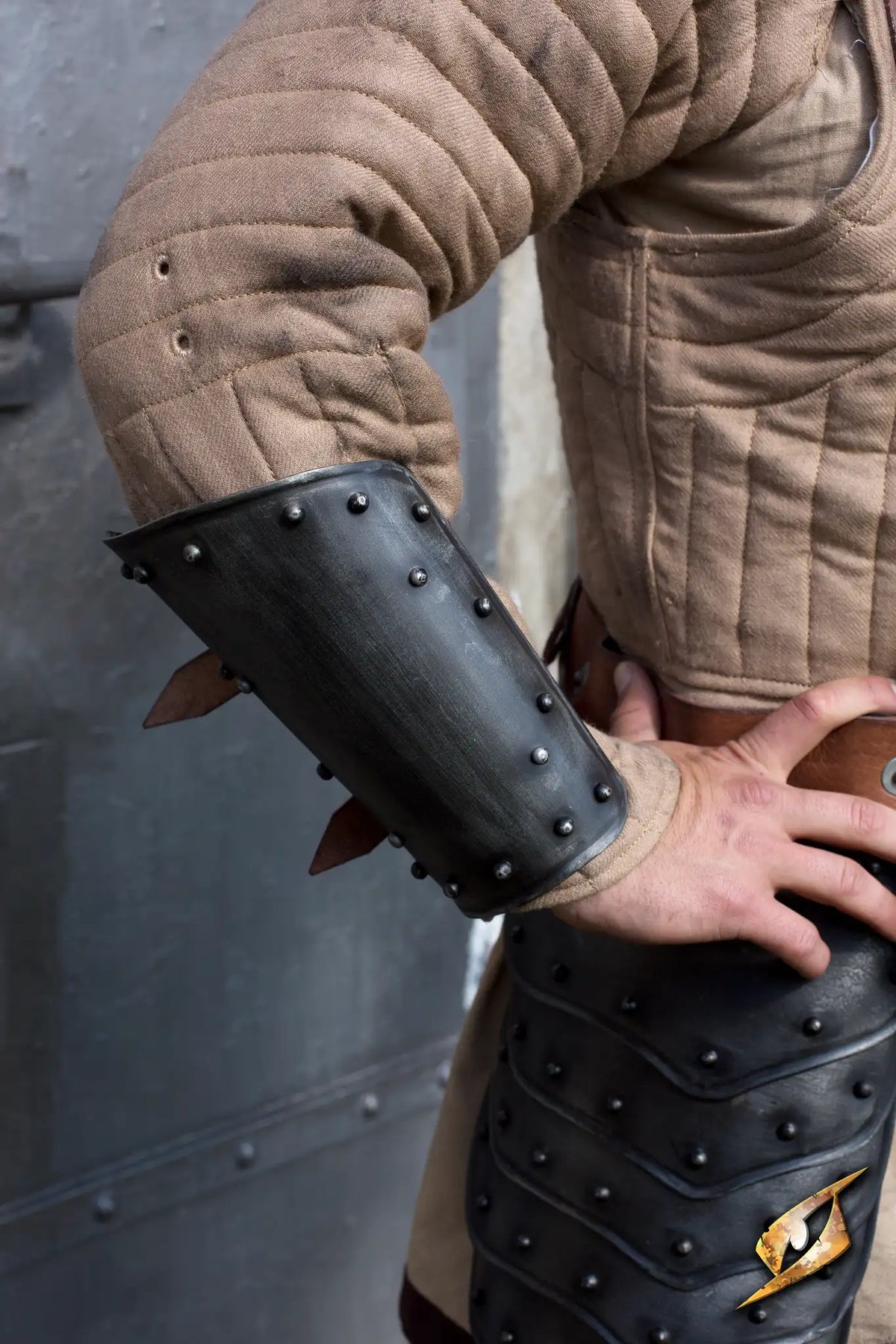 Arm Protection Warrior featuring detailed armored sleeves with studs and a combat-ready look.