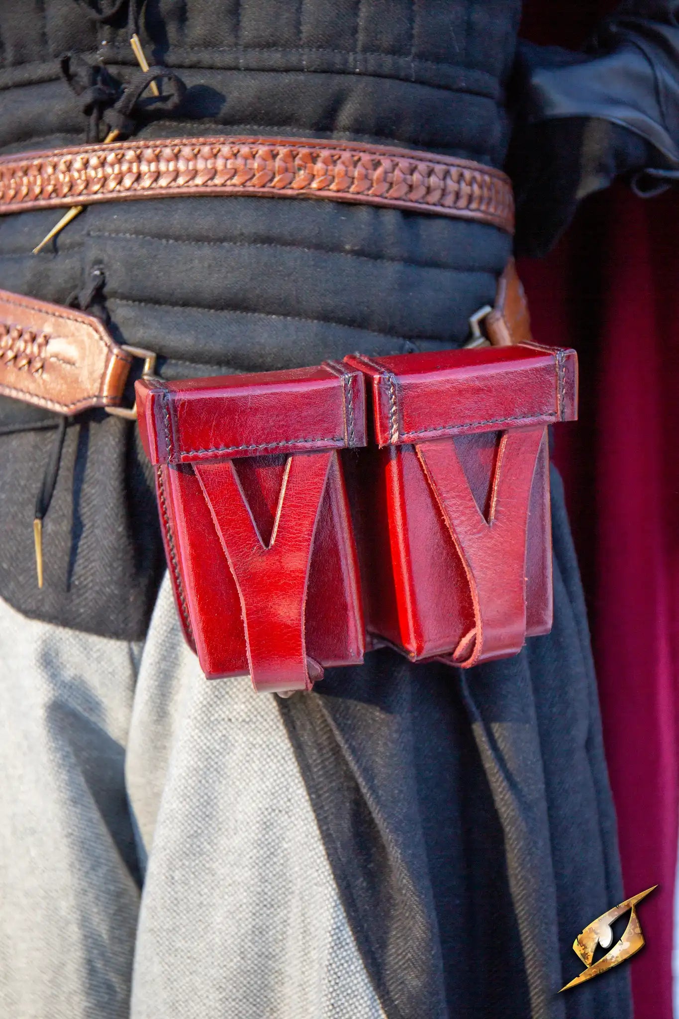 Hard Pouch For Sword Belt displayed on a character's waist with red leather design.