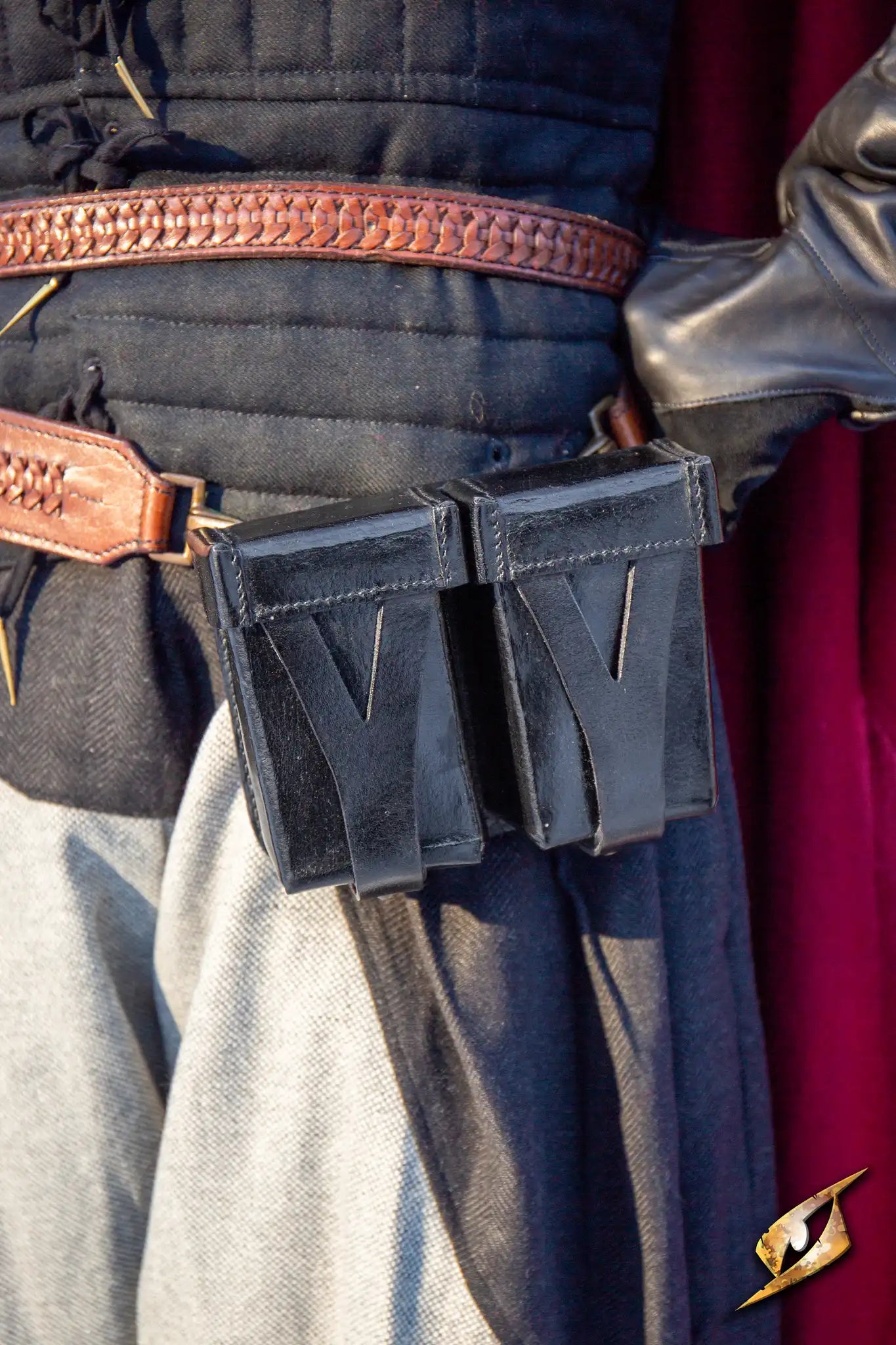Hard Pouch For Sword Belt attached to a costume, showcasing its practical design and leather finish.