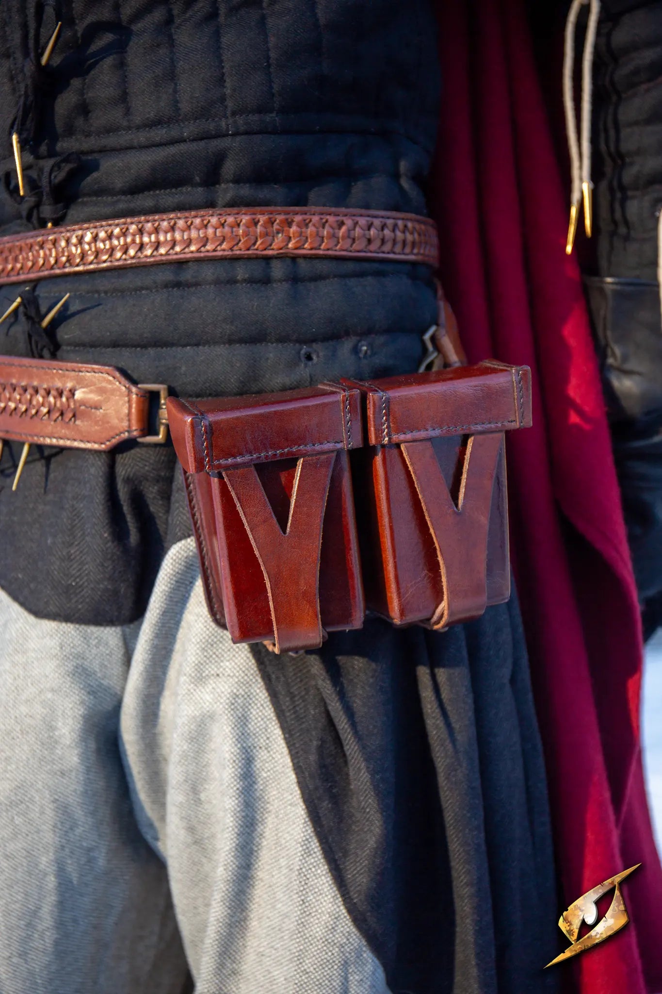 Hard Pouch For Sword Belt attached to a leather belt, showcasing craftsmanship and durability.