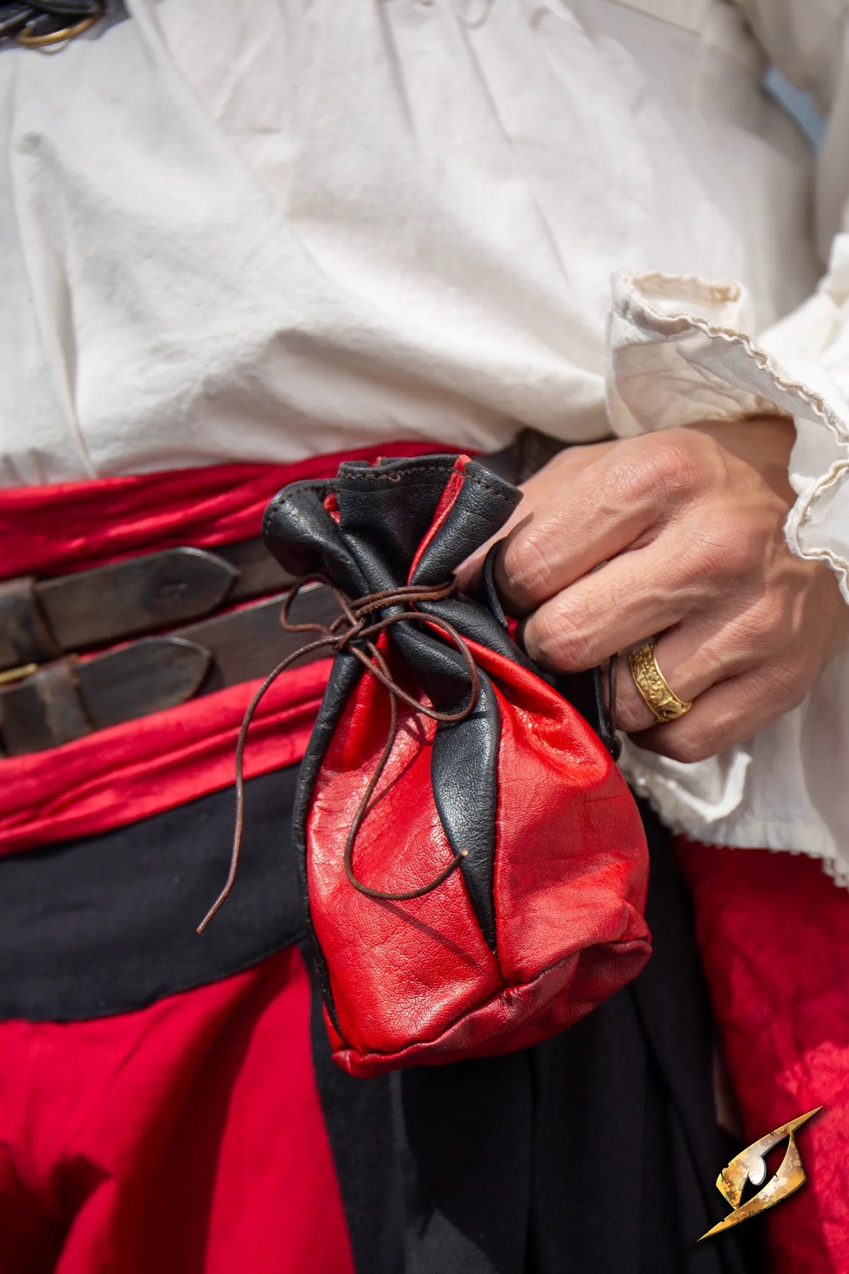 Bounty Hunter Pouch shown in red and black leather, ideal for holding coins and essentials during adventures.