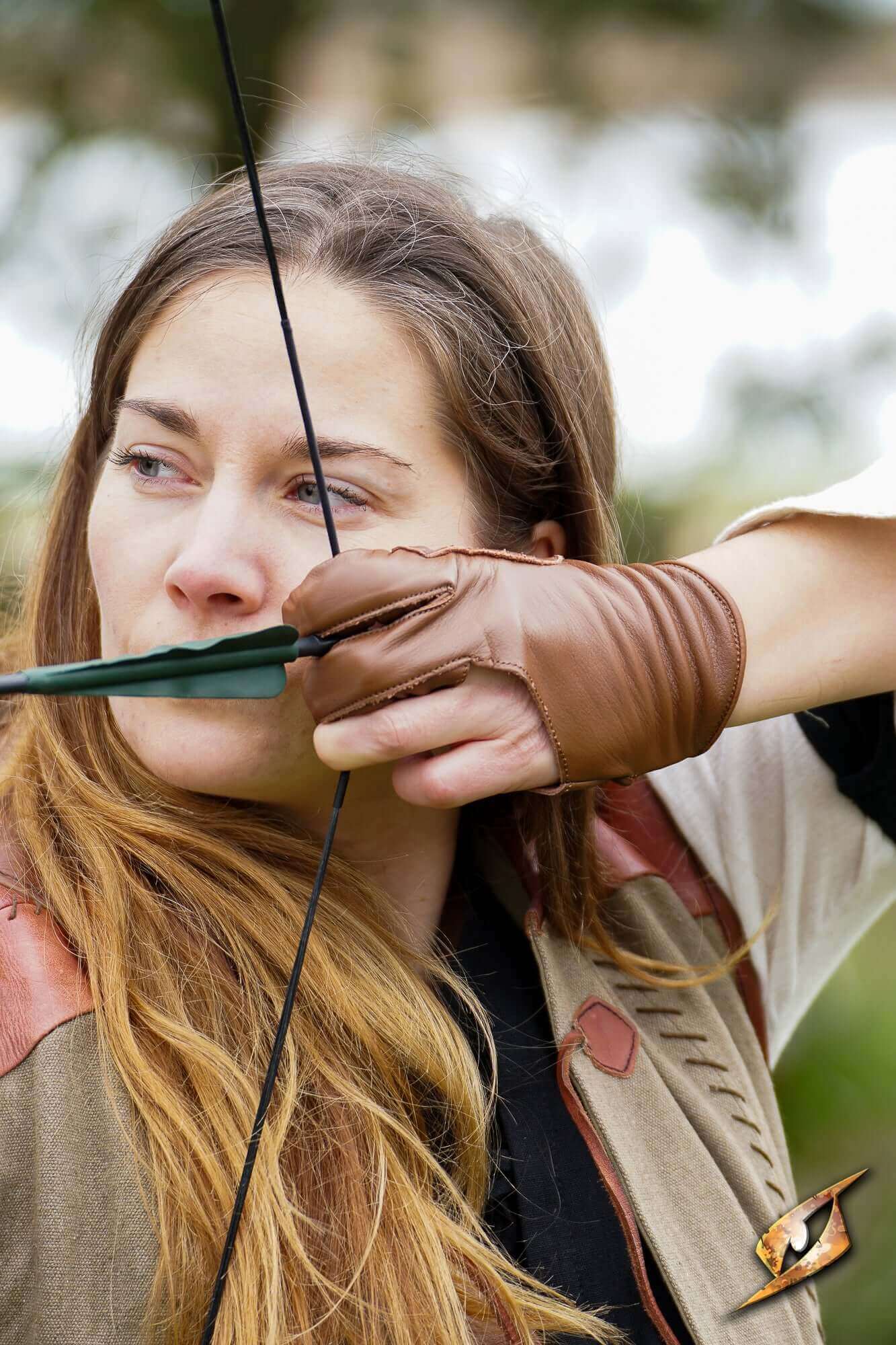 Archery Half-glove worn by an archer during practice, showcasing comfort and protection for shooting.