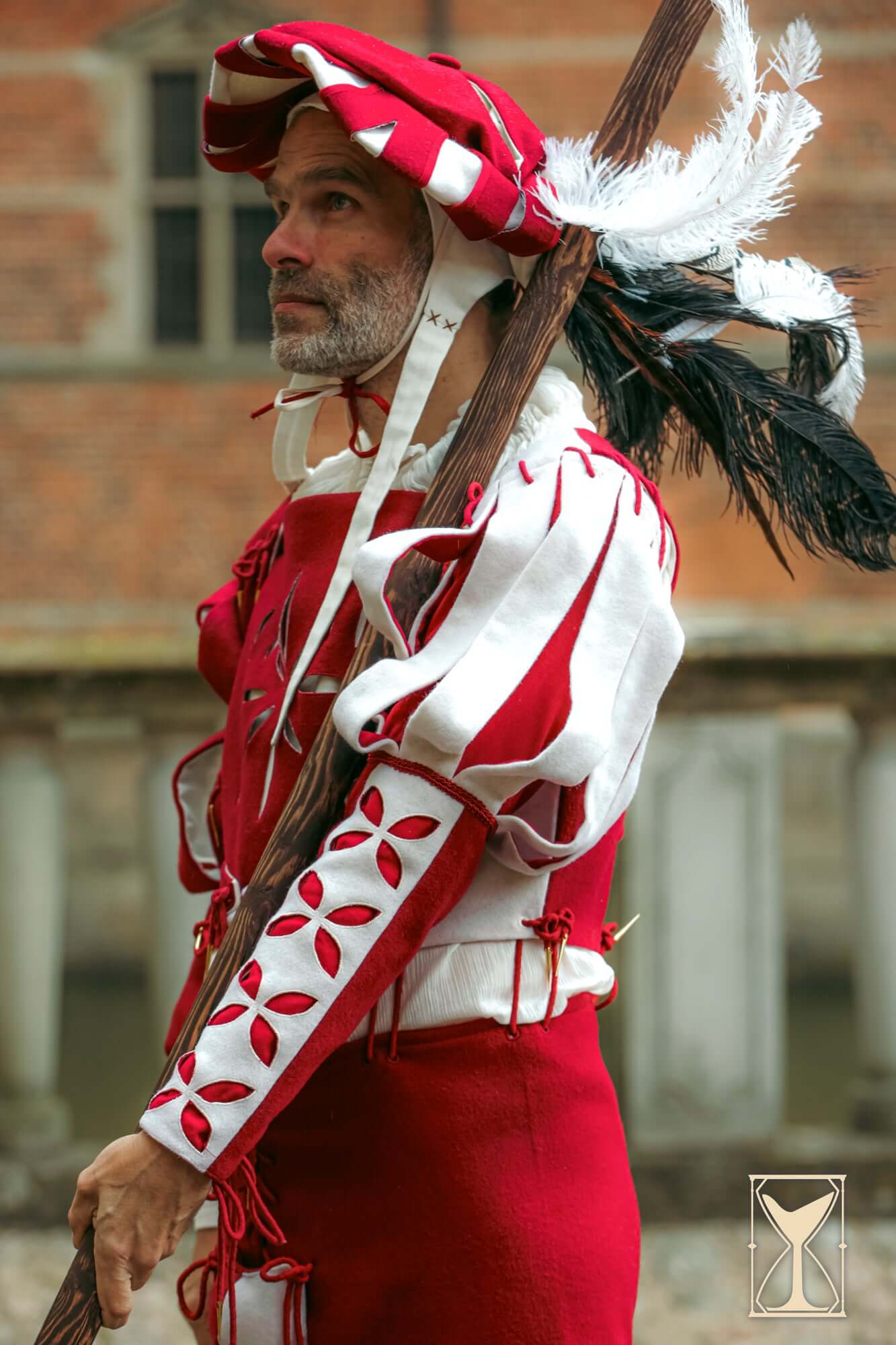 Landsknecht Bloom Sleeve detailed view showcasing slashed and petal motif design in a vibrant costume.