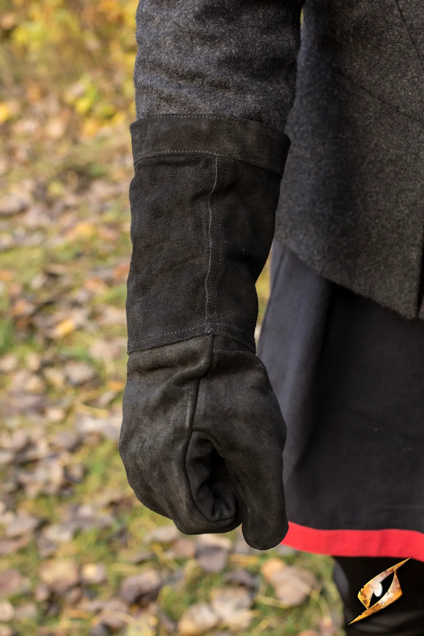 Person wearing leather gloves, showcasing the stylish and versatile design of leather gloves for cold weather.