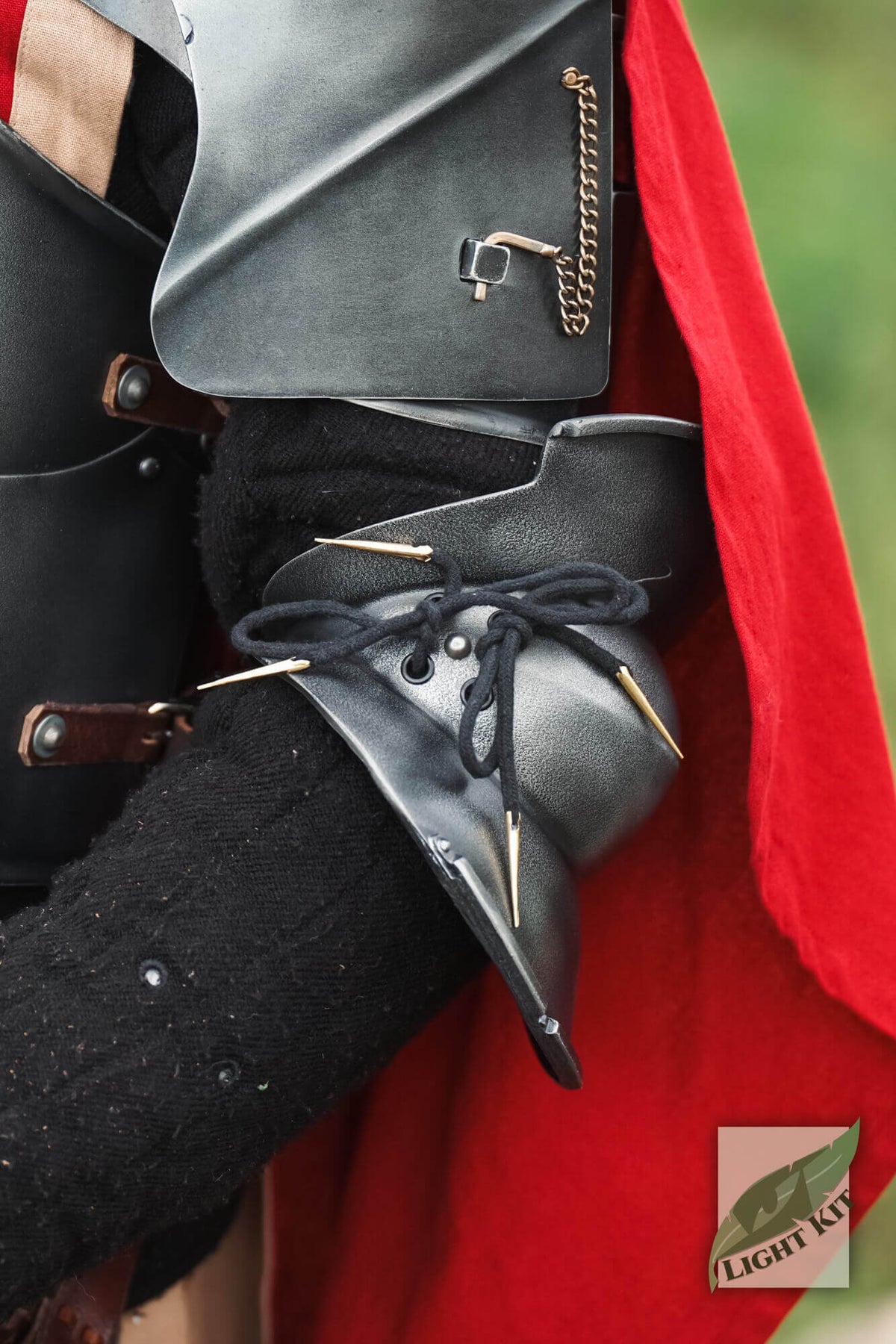 Milanese Couters - Light Kit showcasing protective elbow armor with high-density polyurea material.