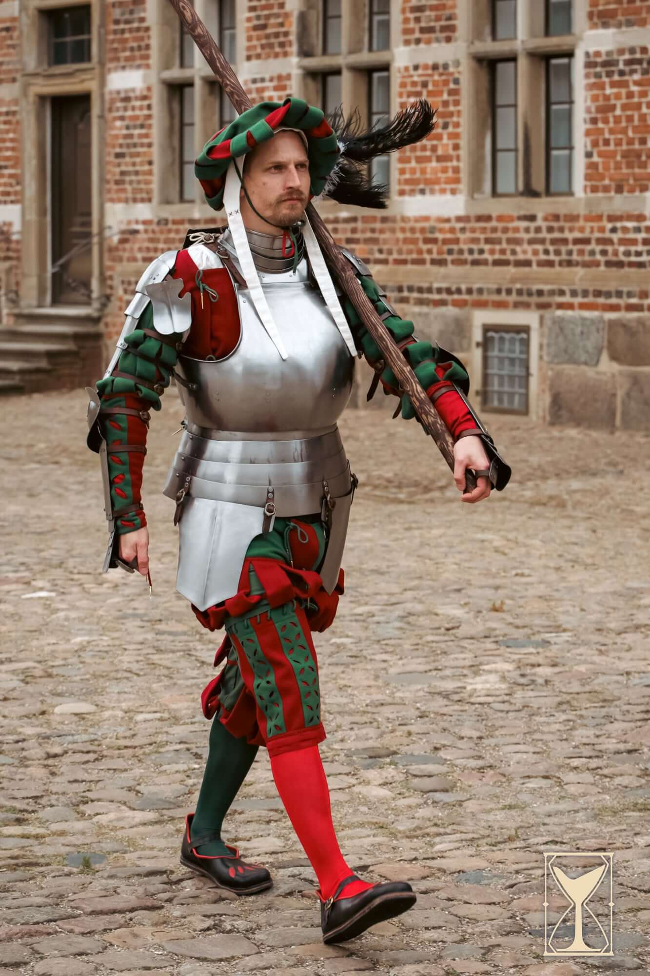 Complete Landsknecht Armour Set - 1.6mm - YoreMade worn by a soldier in Renaissance attire.