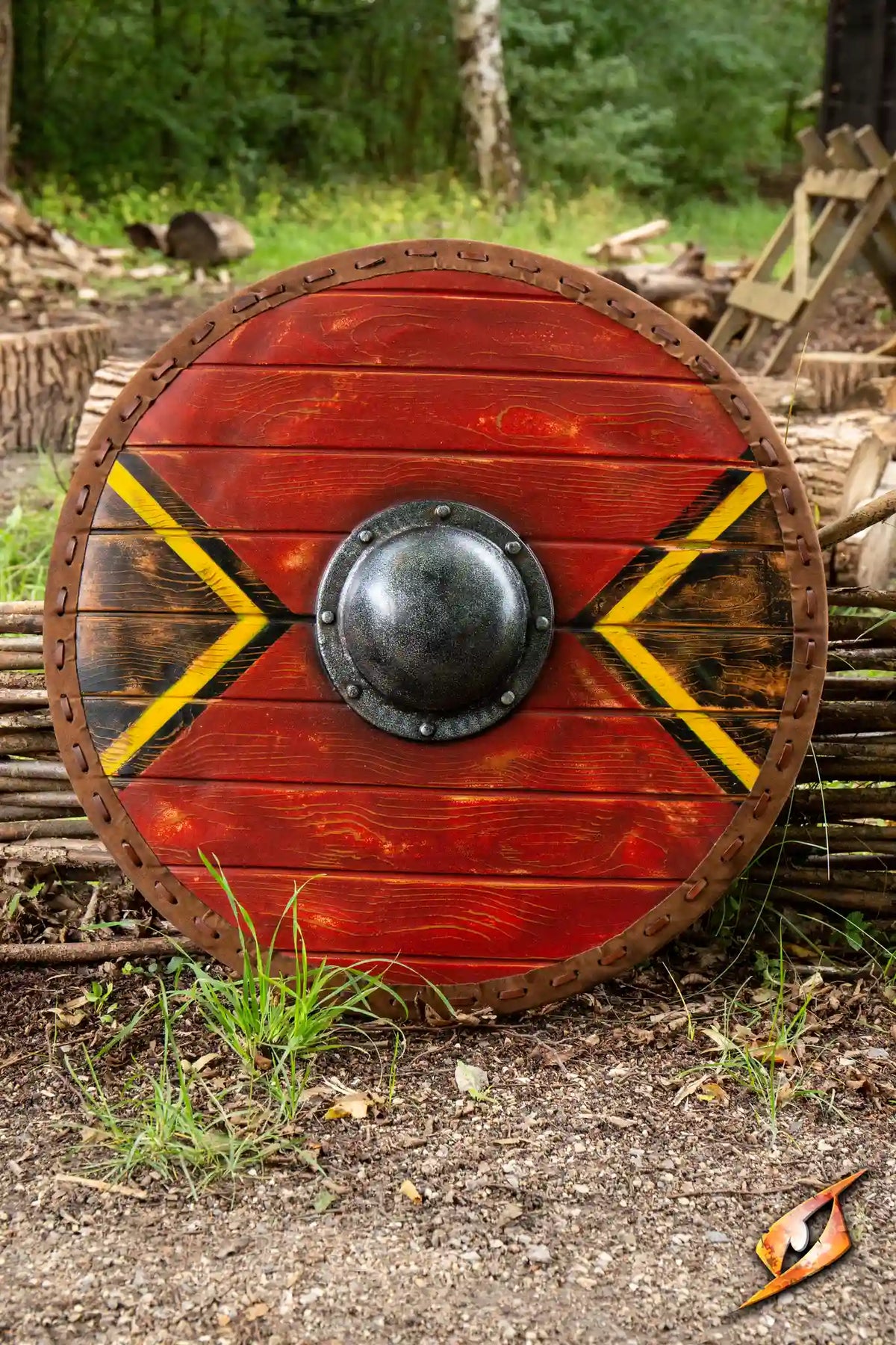 Thegn Shield, a 70 cm round latex shield with red and yellow design, ideal for coastal raids and offensive fighting.