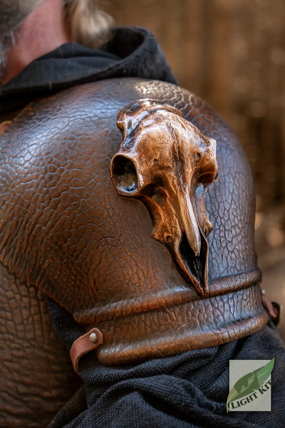 Barbarian Pauldrons PU - One size featuring intricate skull detailing on shoulder armor.