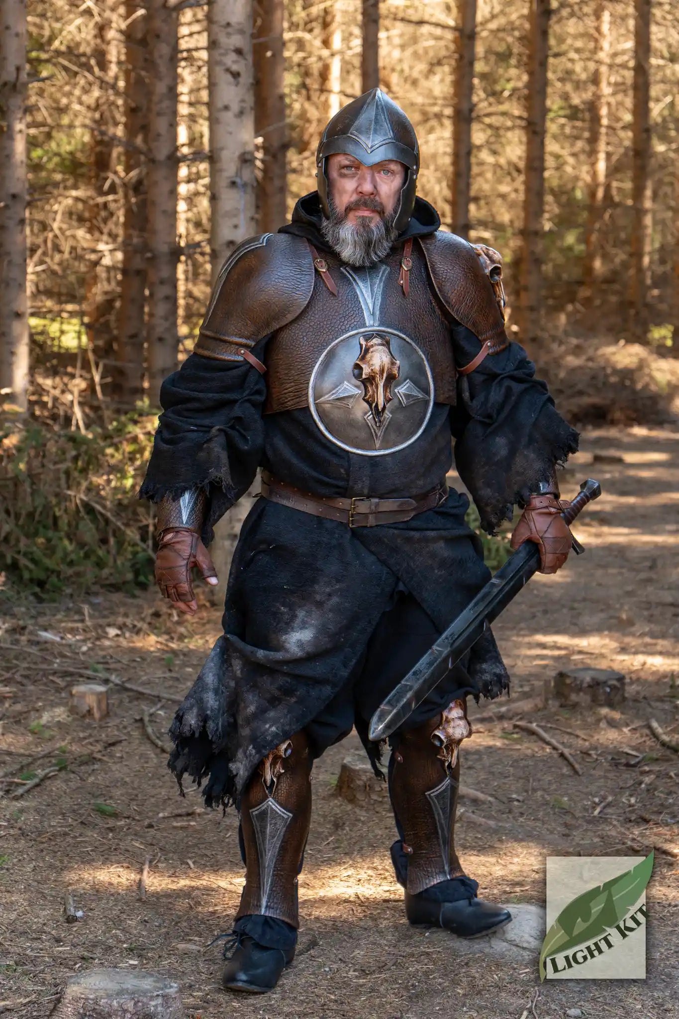 Barbarian Armour Set worn by a warrior in the forest, showcasing lightweight polyurea armor for battle protection.