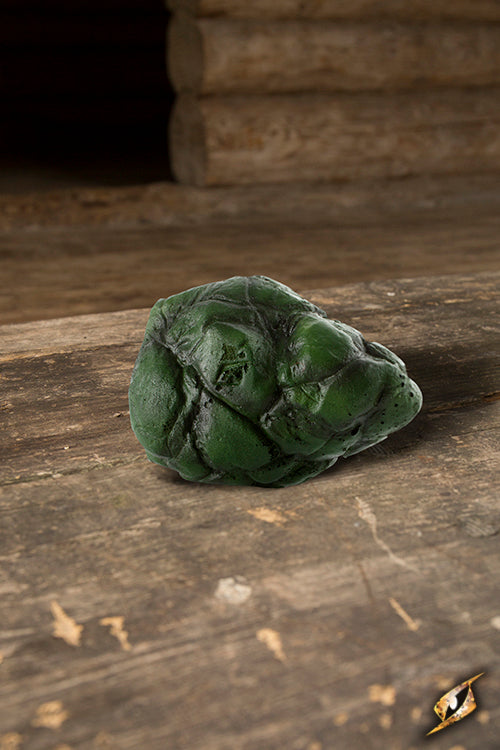 Stone prop used for casting spells, featuring a green Bloodstone texture, ideal for warlocks and magic practitioners.