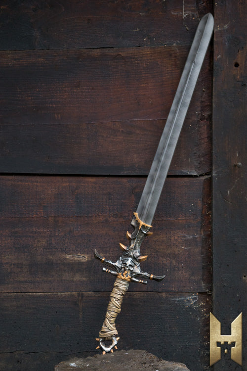 Marauder Sword displayed against a wooden background, showcasing its intricate design and details.