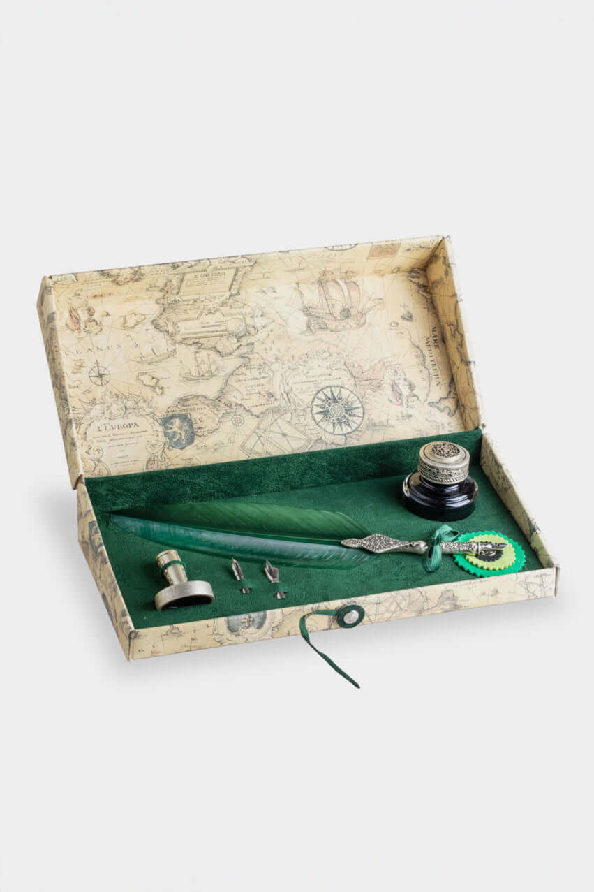 Beautiful Calligraphic Writing Set displayed in an ornate box with a feather pen, ink, and nibs.