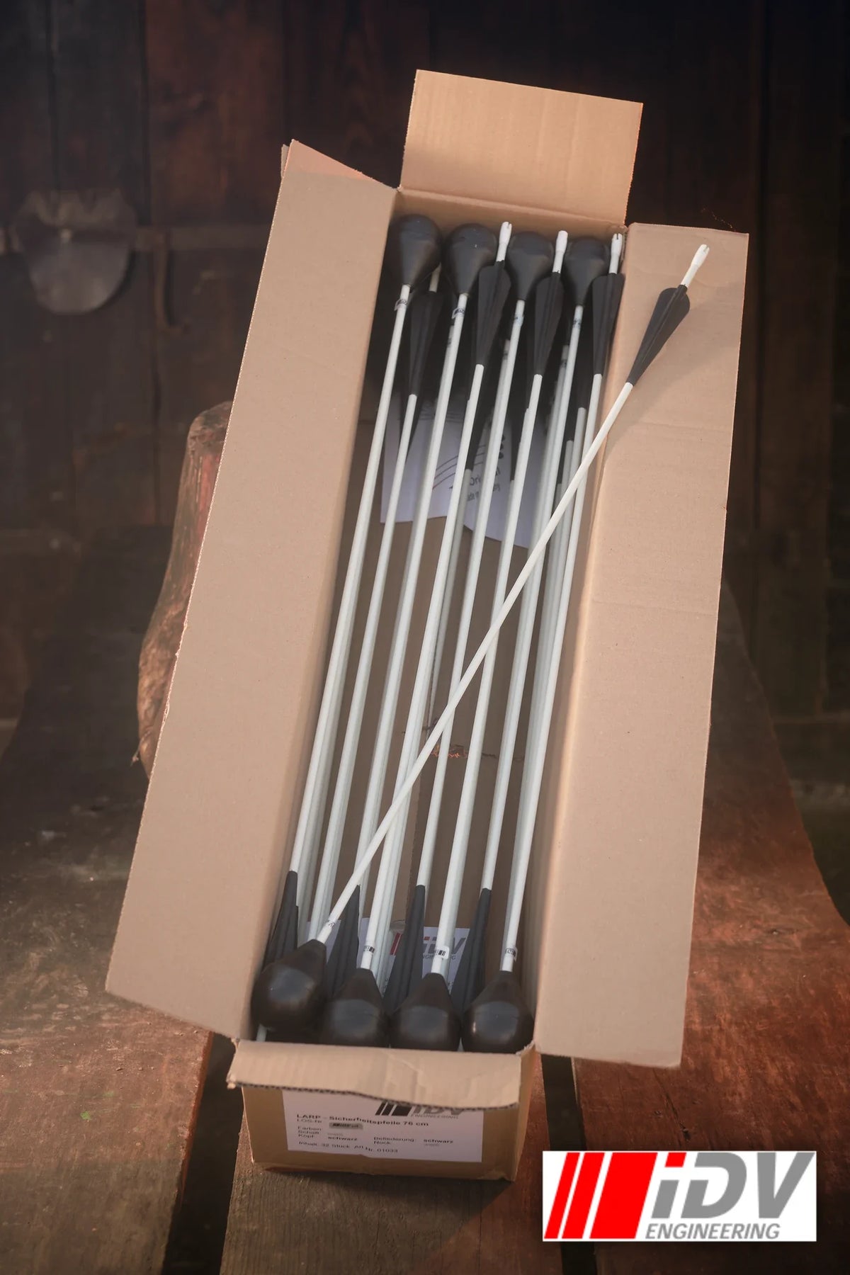 Arrow - Round Head - White Shaft in a box, showcasing multiple round head arrows with white shafts.
