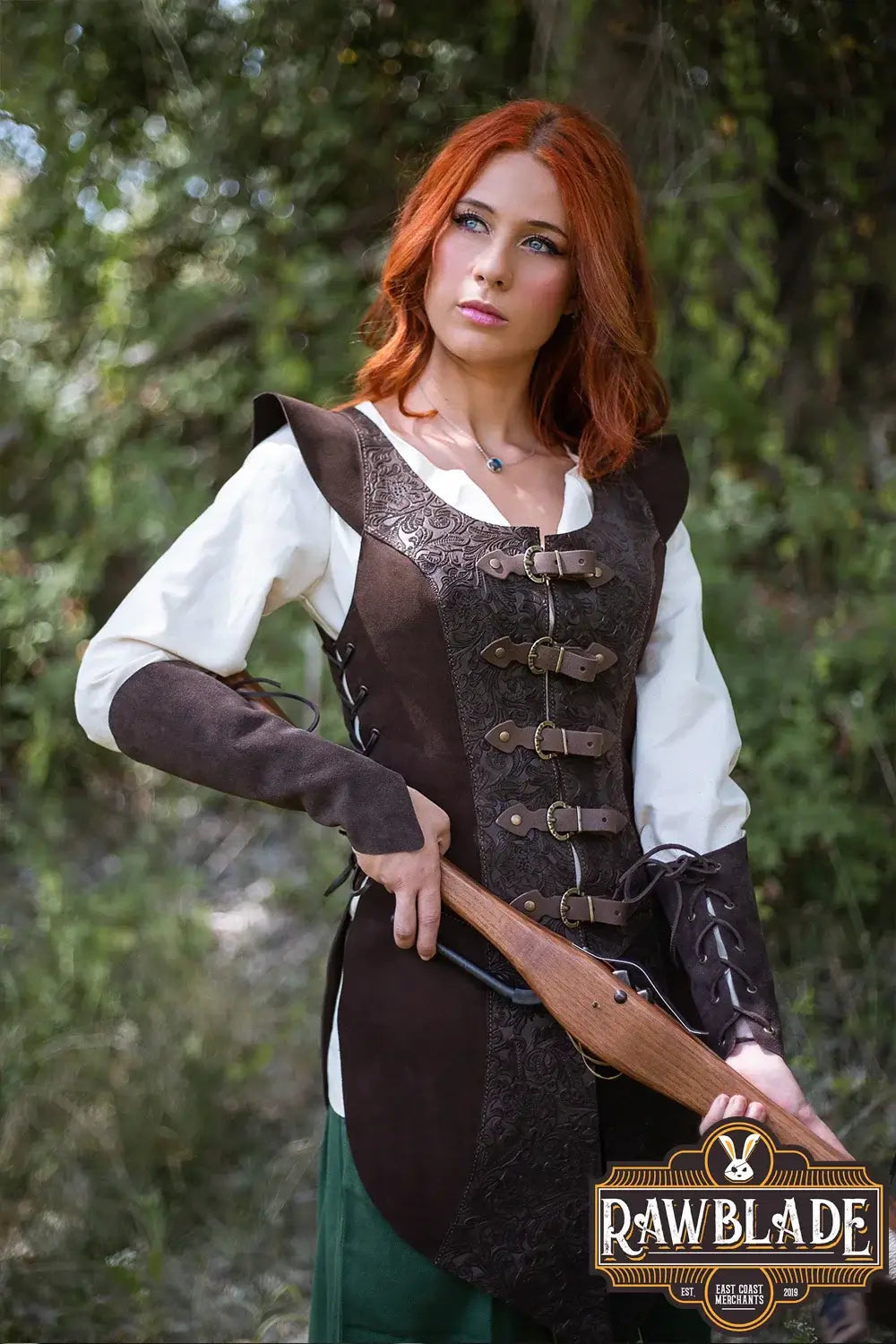 Ylenne Deluxe Long Doublet worn by a model, featuring embossed leather and intricate buckles, perfect for combat.