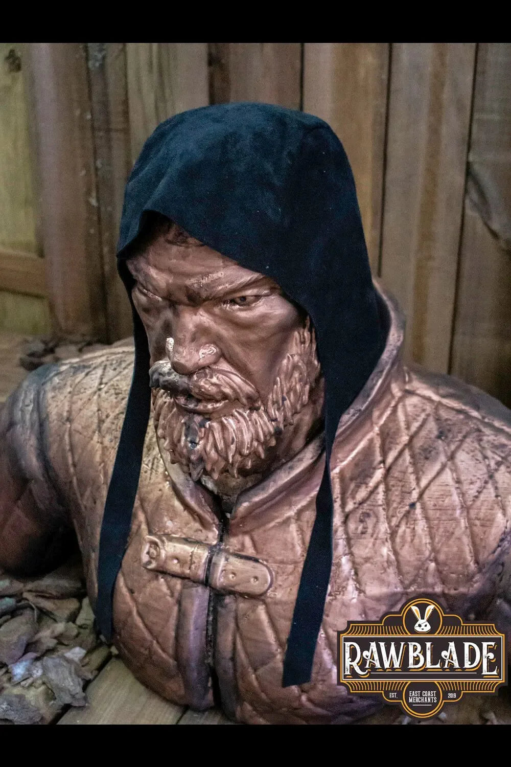 Barbadok Leather Coif displayed on a statue, highlighting its quality leather and versatile design.