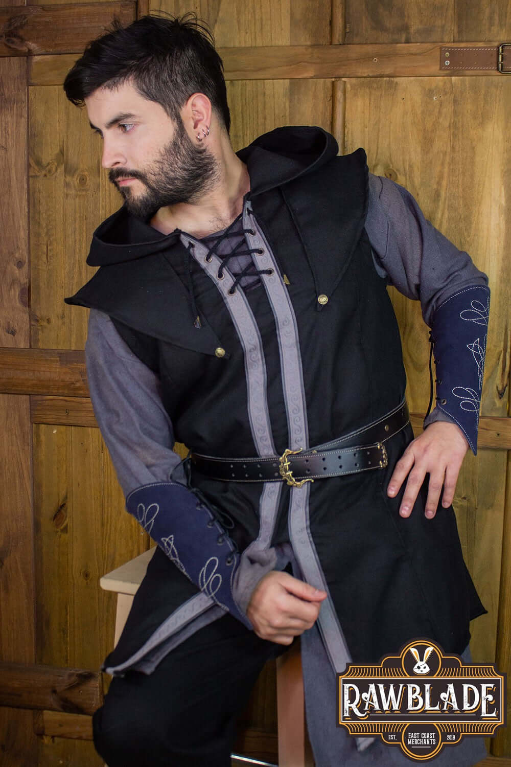 Man wearing Karanthir Tunic with wide hood, perfect for young wizards and elven trackers.