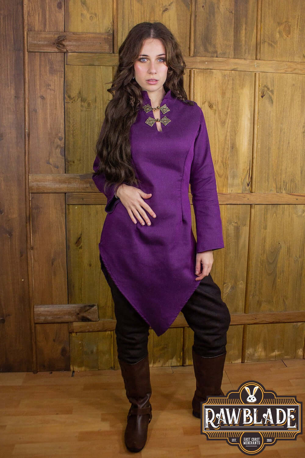 Model wearing the Astherii Tunic from Rawblade, showcasing its unique design and vibrant color.