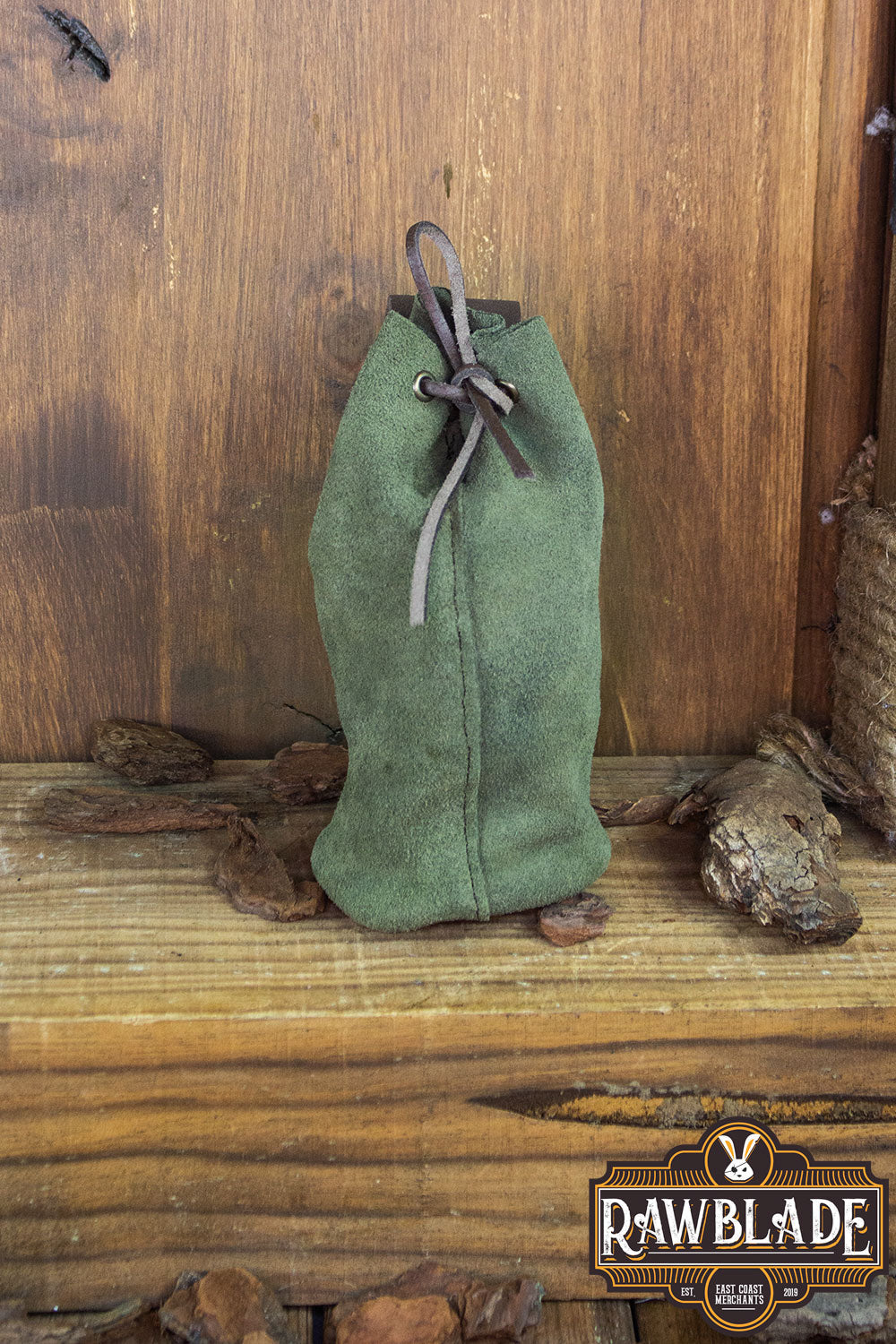 Adventurer Tube Pouch in green, perfect for carrying coins, keys, and more for outdoor adventures.