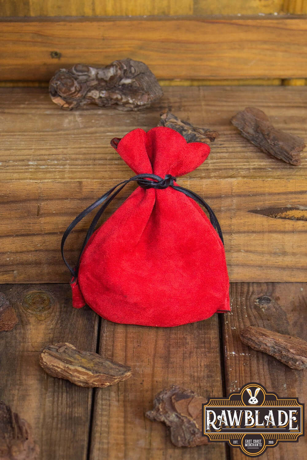 Alentorn Coin Bag made of soft split leather, red color, perfect for safely storing coins or small items.