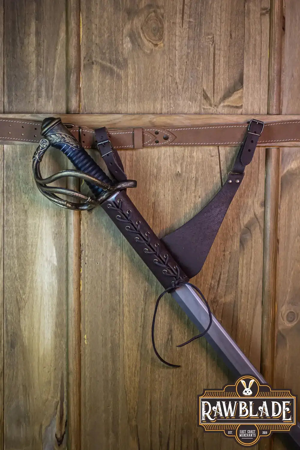 Breda Rapier Holder Small with high quality leather and sword attached, showcased on a wooden background.
