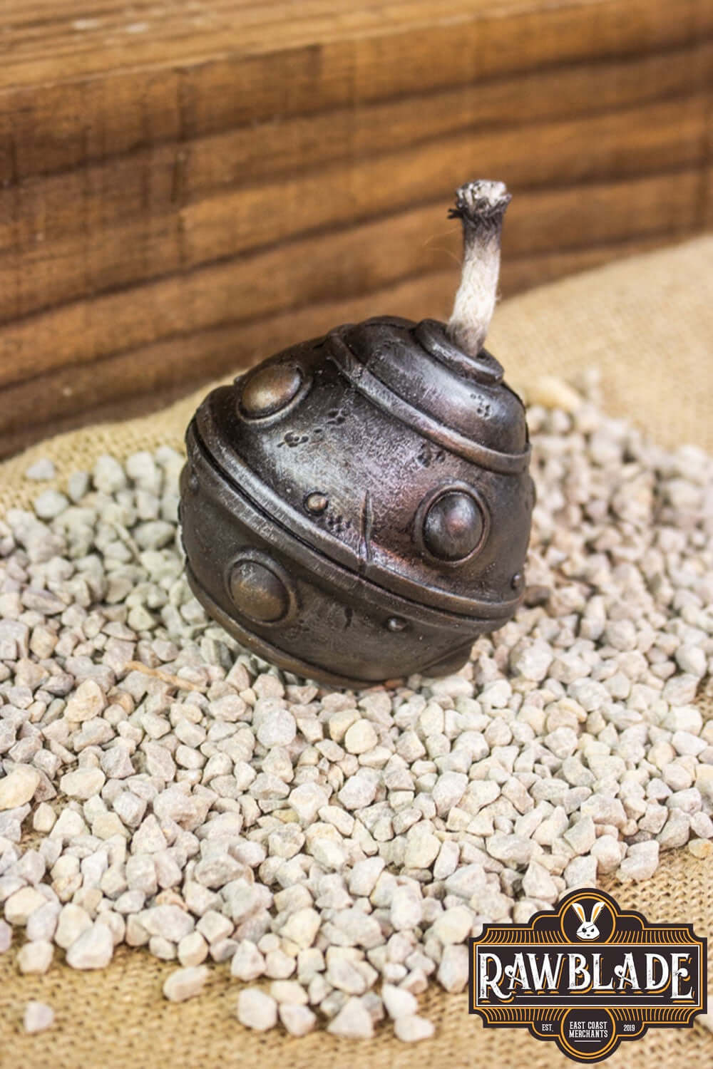 Breacher Bomb handcrafted product on decorative gravel background by Rawblade, showcasing realistic detailing.