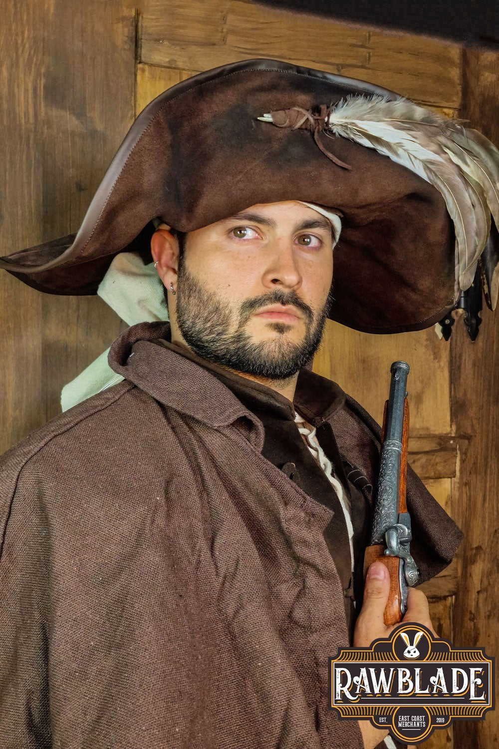 Man wearing Captain Teague Hat with Feathers, showcasing a pirate look with a weathered appearance and feathers.