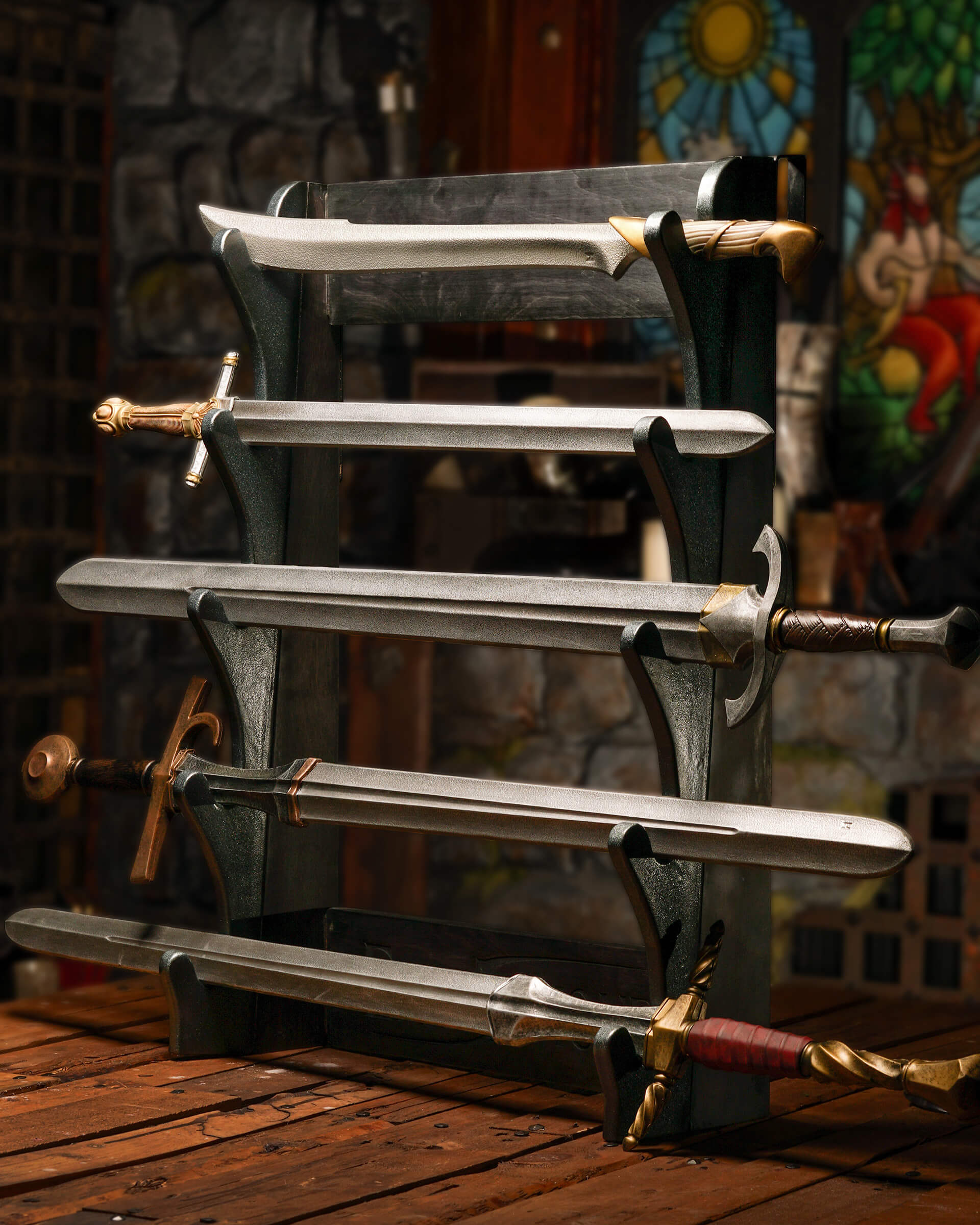 Set of swords displayed on a stand with a stained glass window in the background