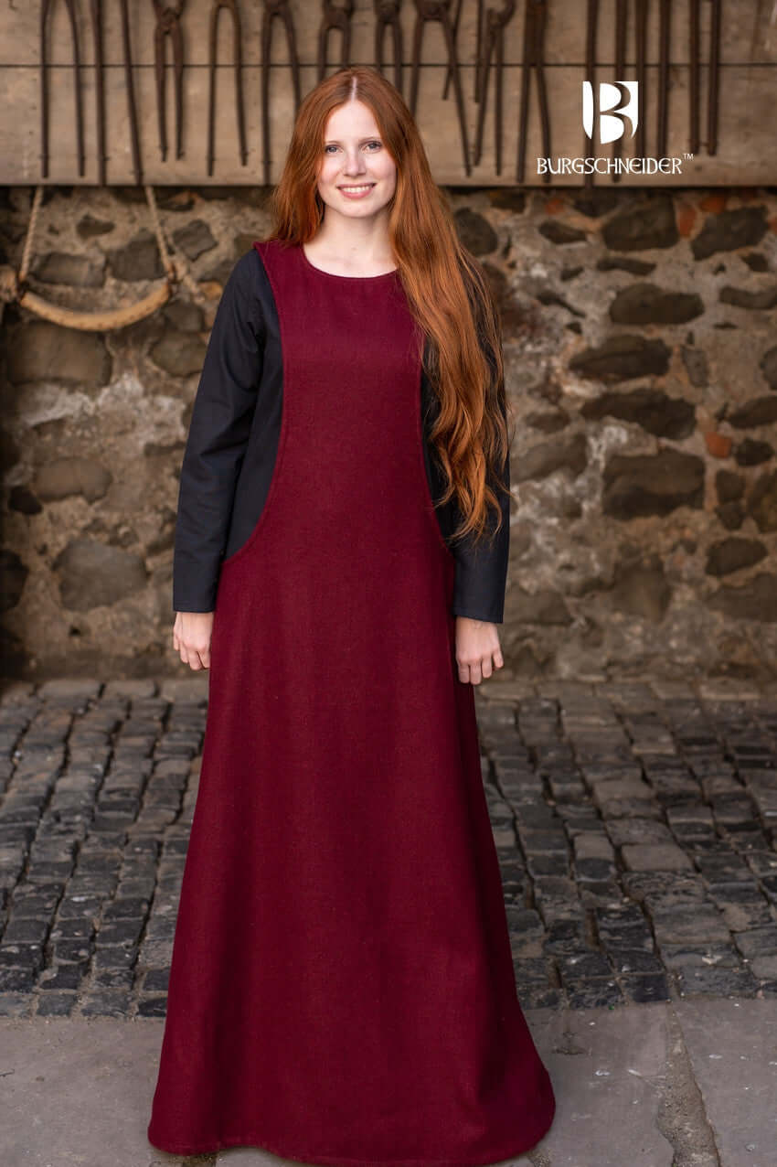 Wool Surcot Albrun in red felted wool, featuring a sleeveless design and elegant appearance from Burgschneider.
