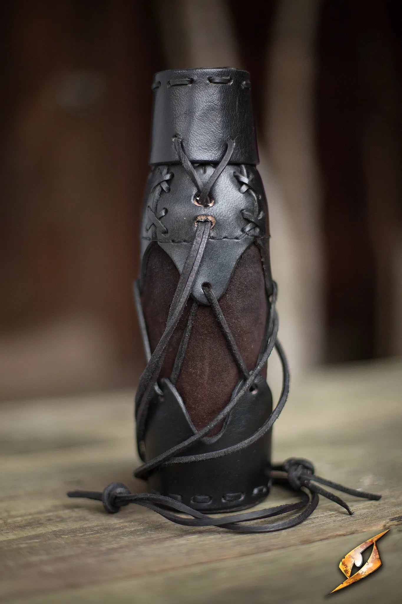 Laced Bottle Holder handcrafted with leather for rugged outdoor adventures