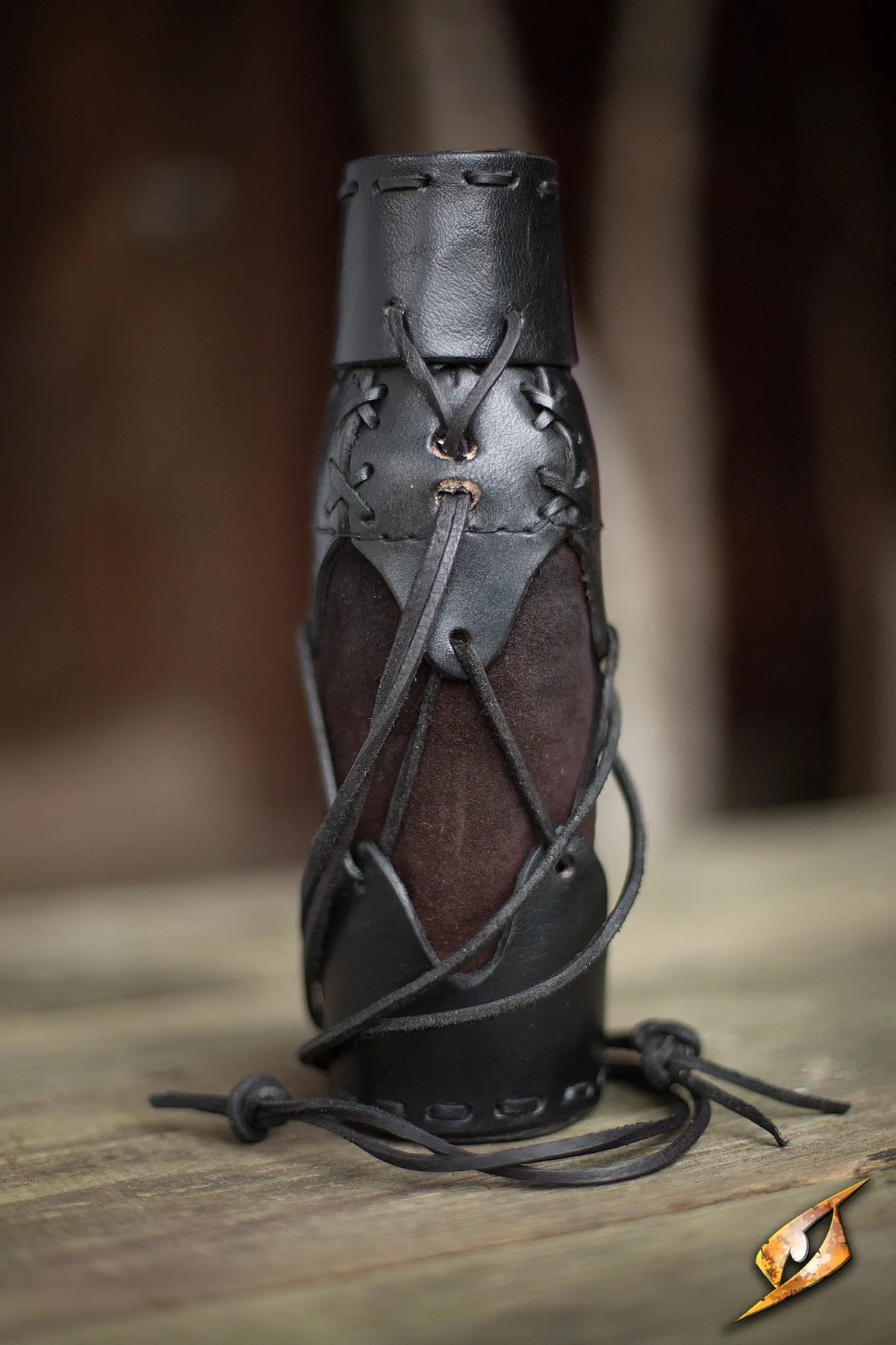 Laced Bottle Holder handcrafted with leather for rugged outdoor adventures