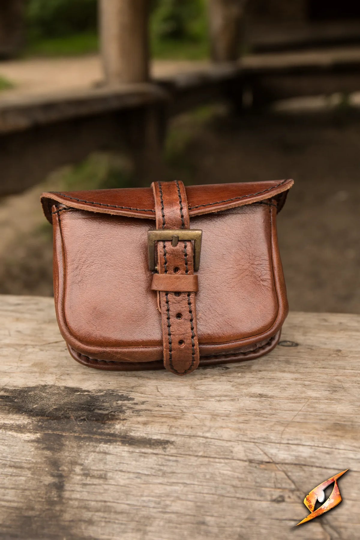 Warrior Bag - Small in ox brown leather with brass buckle, perfect for securely carrying items during combat.