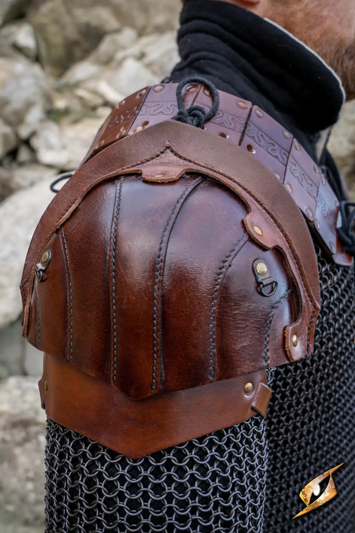 Woodsman Shoulder Set made of black leather, featuring detailed design and comfortable fit for armor enthusiasts.