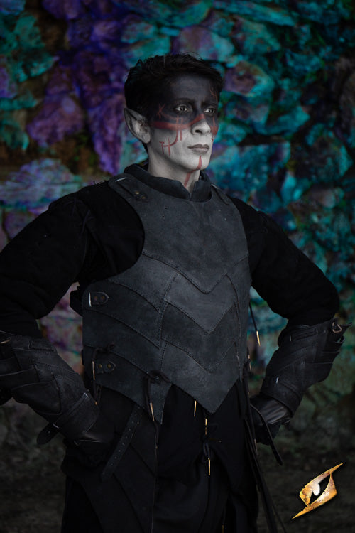 Person wearing Shadow Armour Set - Suede, showcasing fantasy-themed attire in a mystical forest setting.