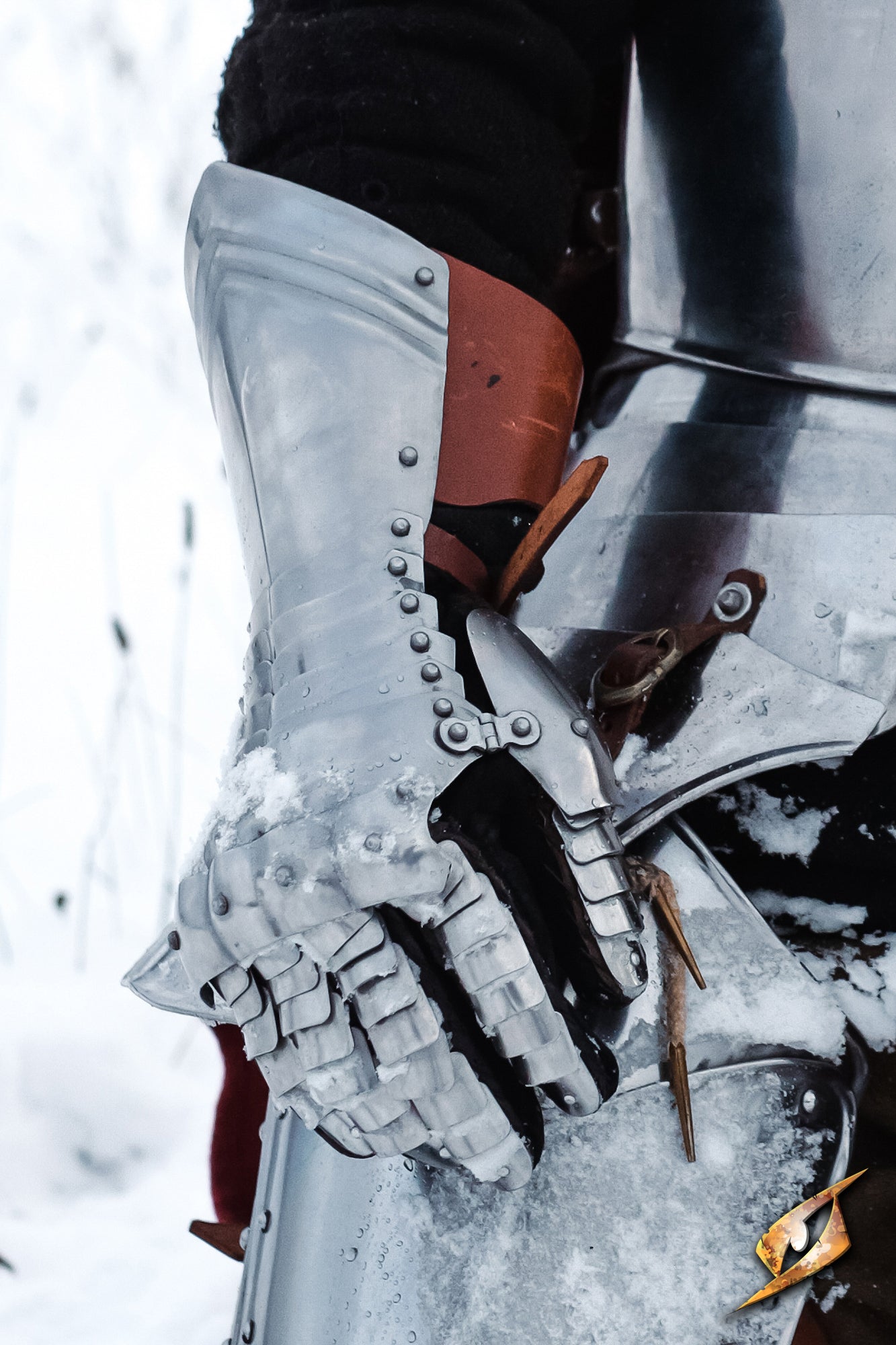 Gauntlets: early renaissance articulated steel gloves providing protection and maneuverability in combat.