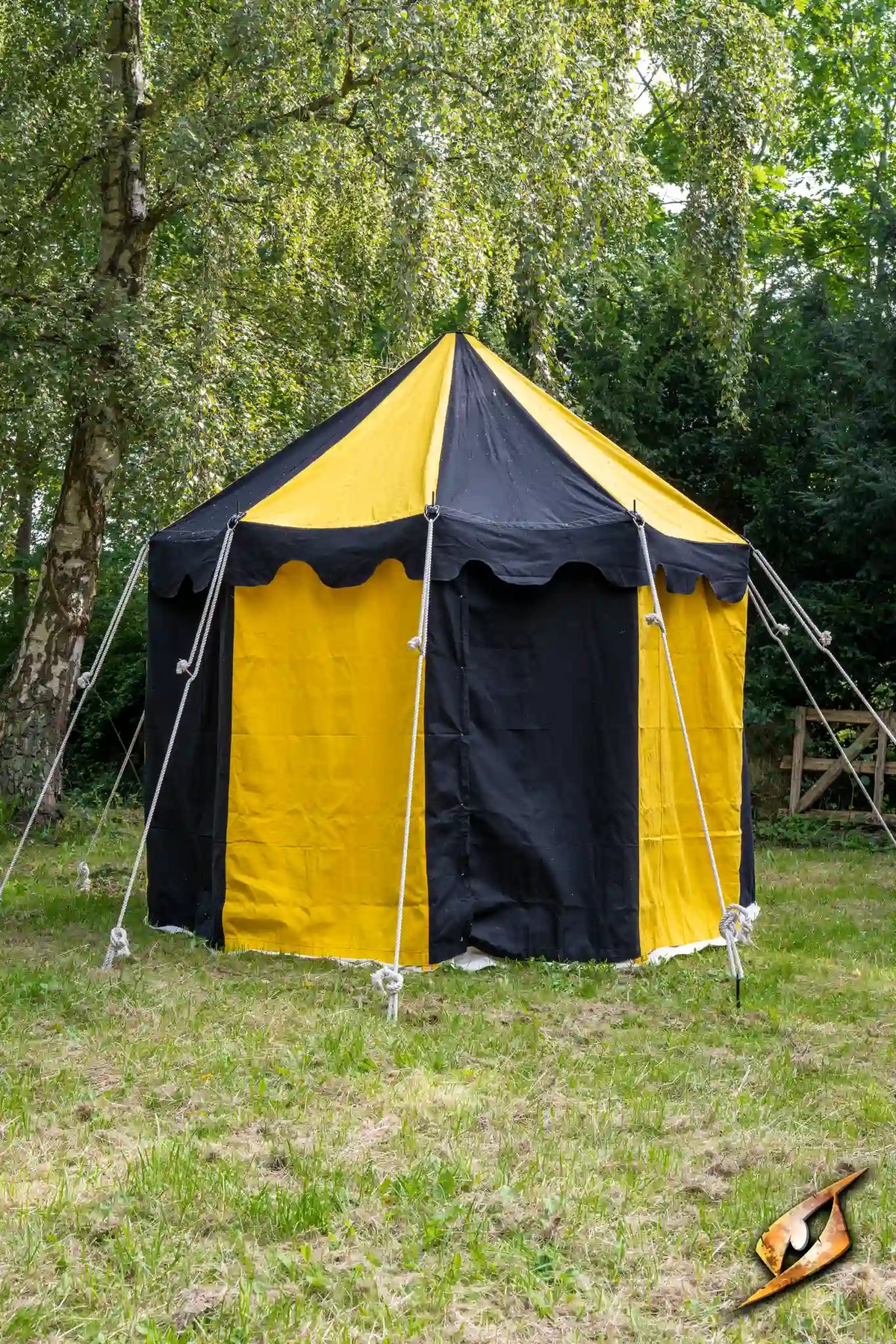 Round Pavilion Tent - 3m in black and yellow, set up in a grassy area surrounded by trees.