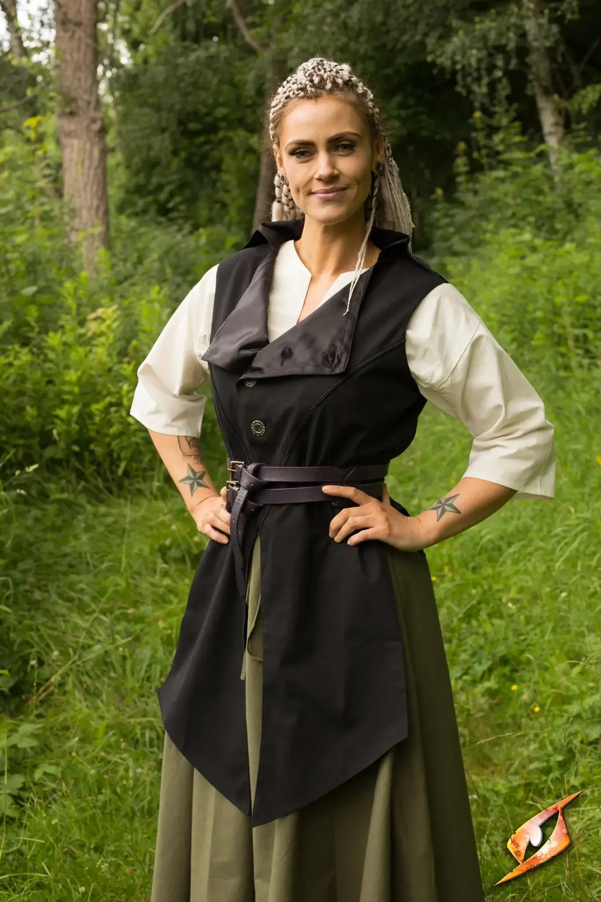 Model wearing a Vest Dorian in a natural setting, showcasing its stylish and functional design.