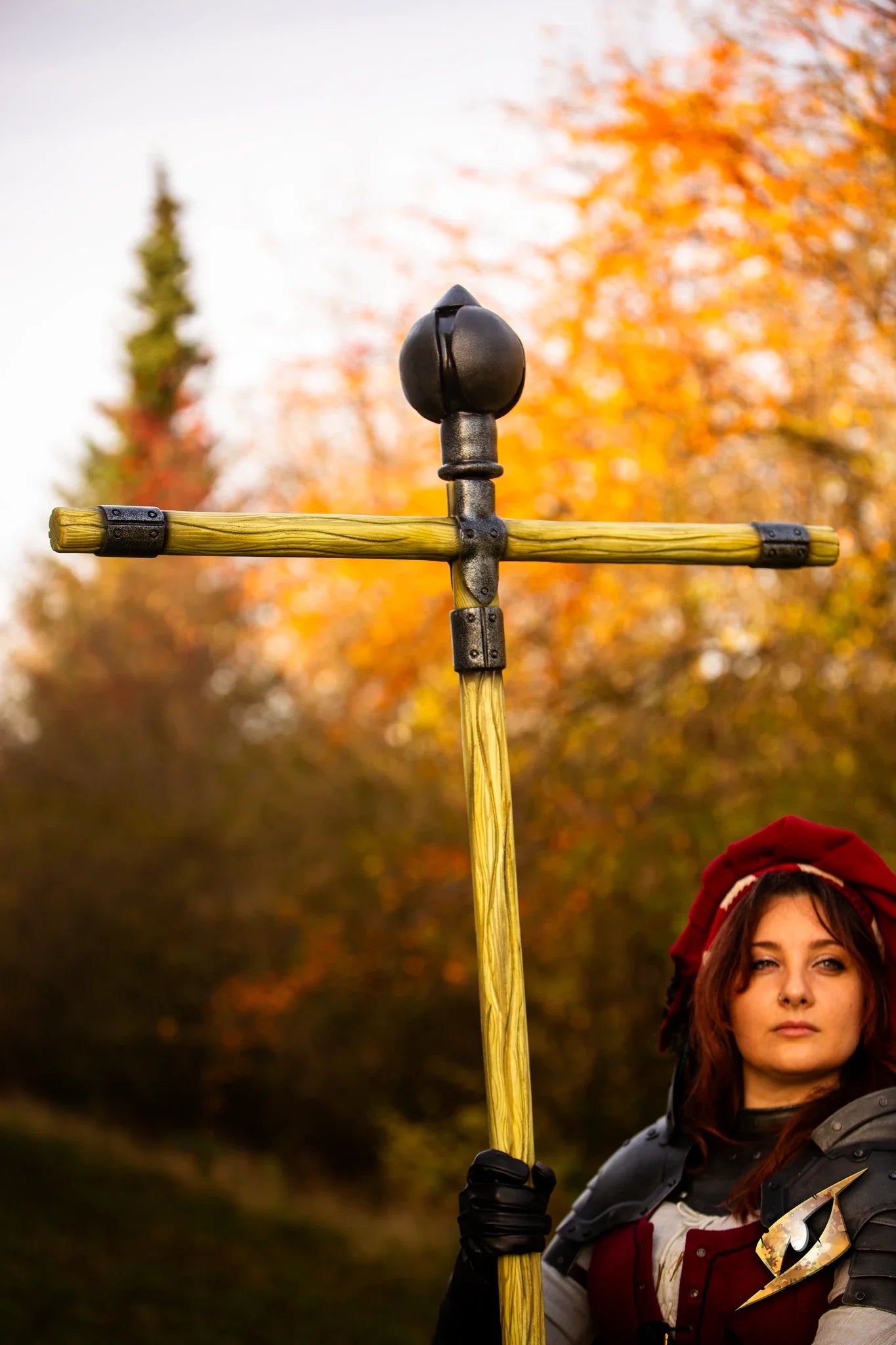 Battle Standard - Lord's Orb Top held by a cosplayer in a forest setting, showcasing its regal design.