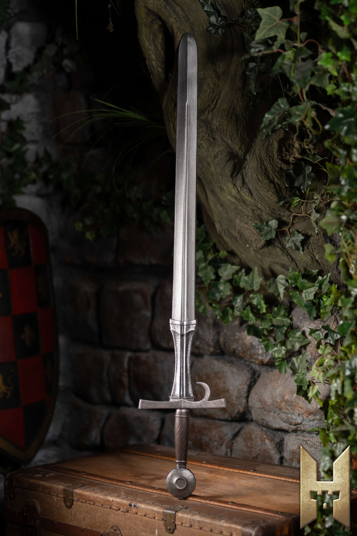 Milanese Sword standing elegantly against a stone wall, showcasing Renaissance design and durable construction.