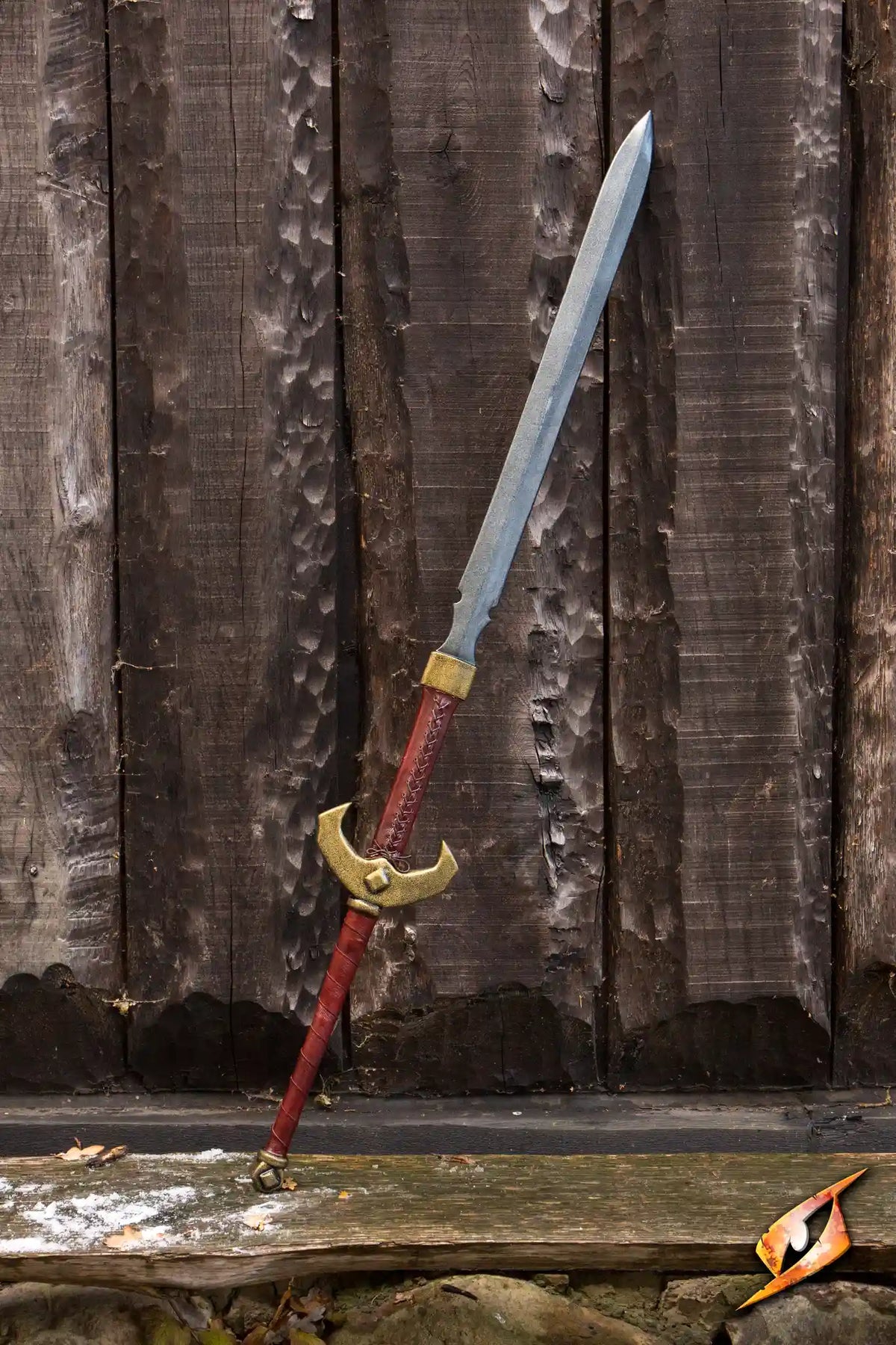 Baal - 140 cm two-handed sword displayed against a rustic wooden background.