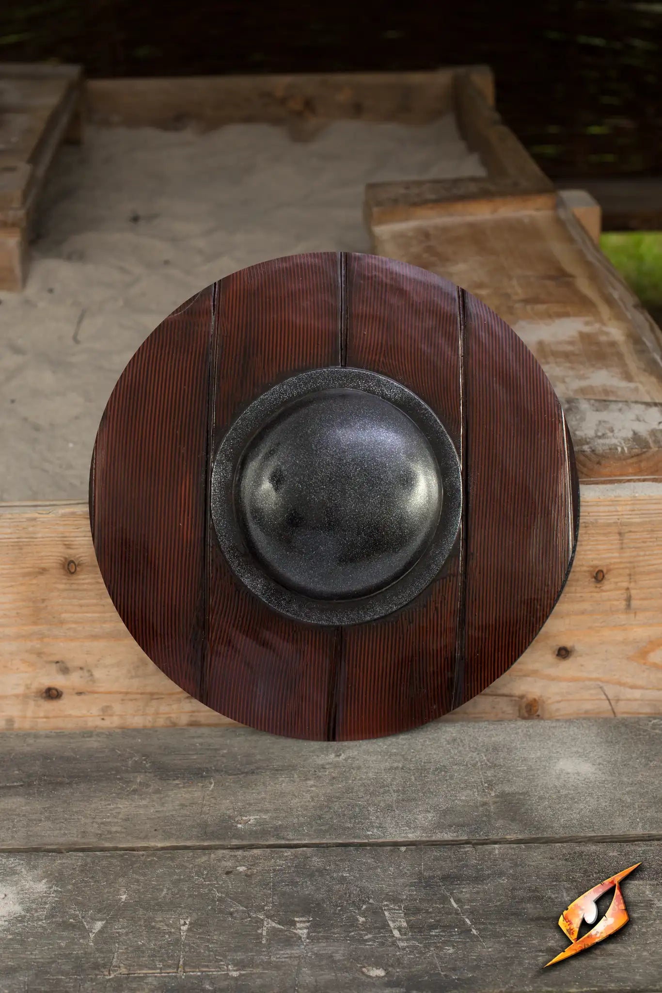 Wooden Buckler - 40 cm round shield with a dark wood design and central shield boss, ideal for historical reenactments.