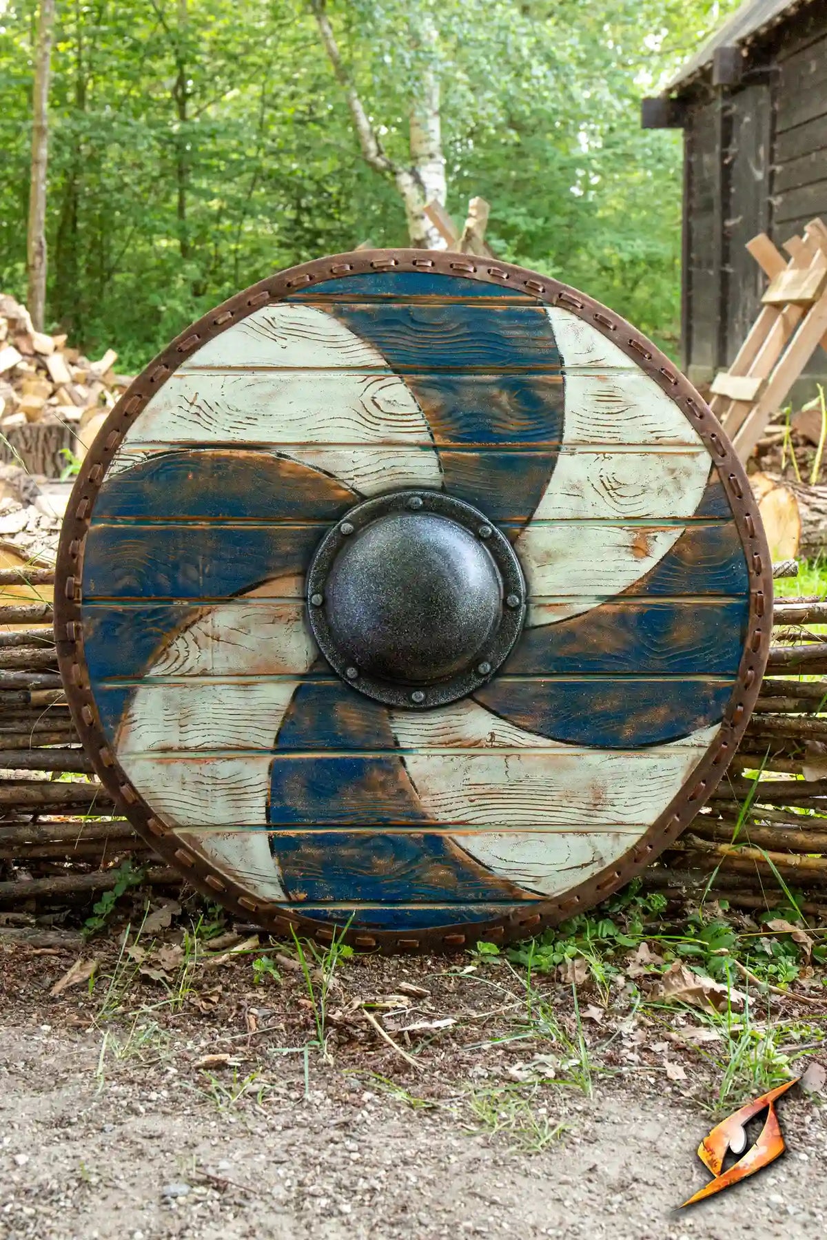Thegn Shield by Epic Armoury, a 70 cm round latex shield with a blue and white spiral design.